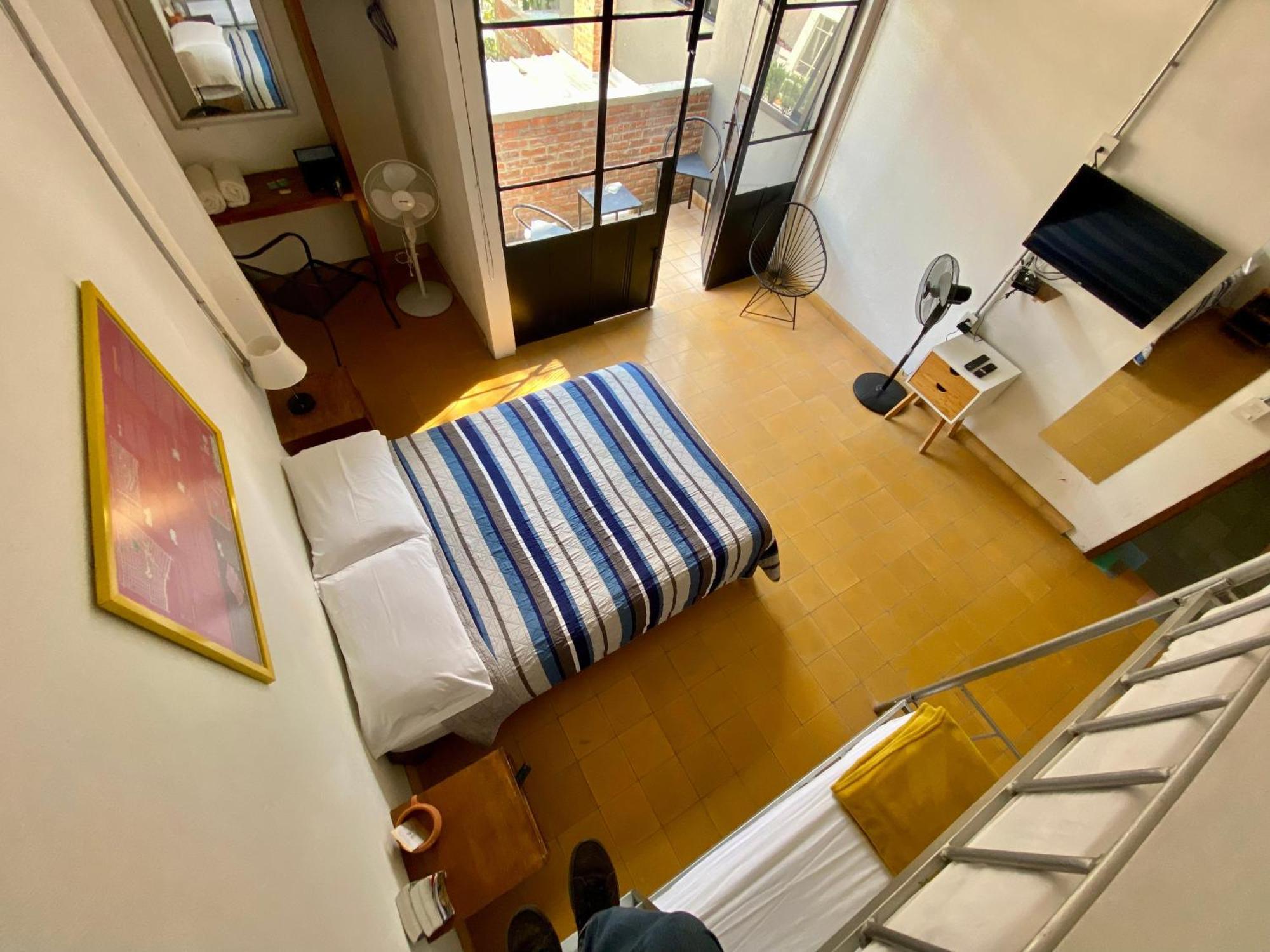 Quadruple Room with Shared Bathroom