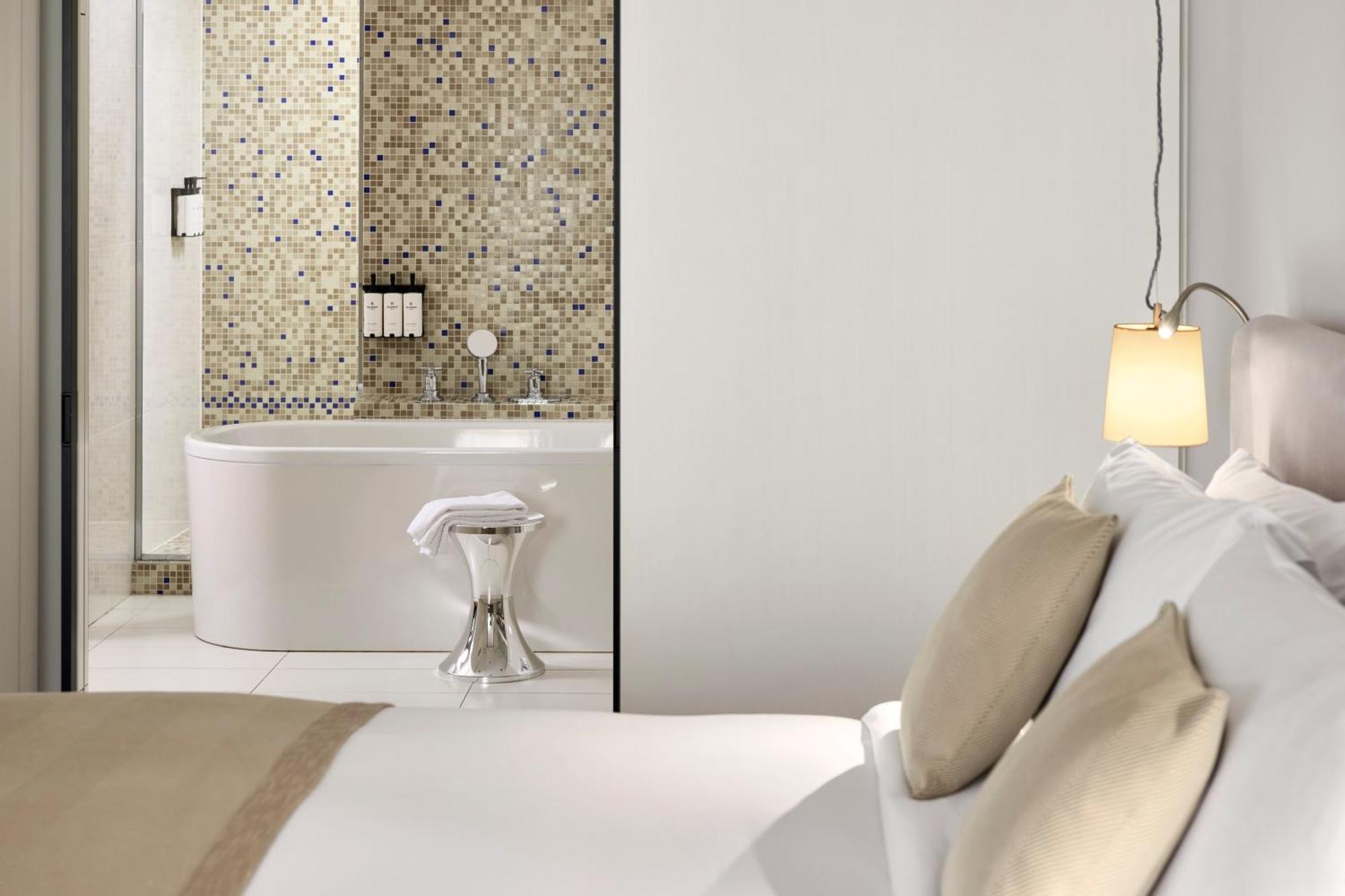 Suite Prestige con sofá cama y cama extragrande