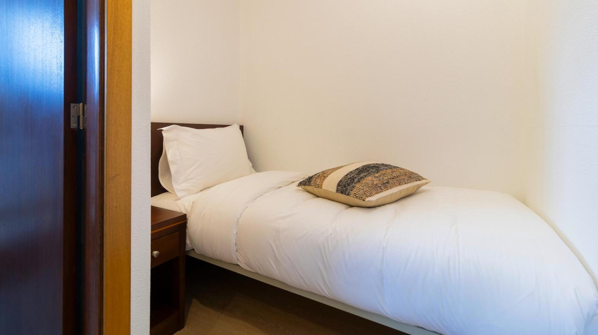 Habitación Triple con balcón