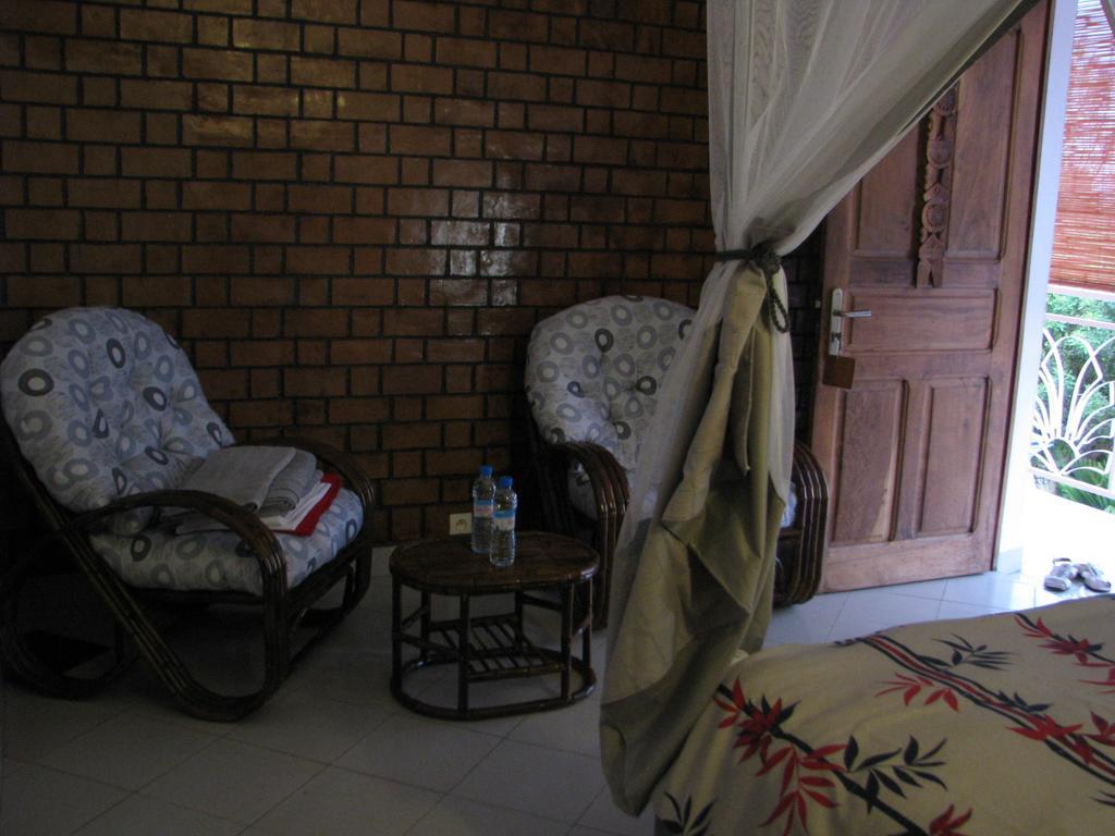 Chambre Triple - Vue sur la Piscine