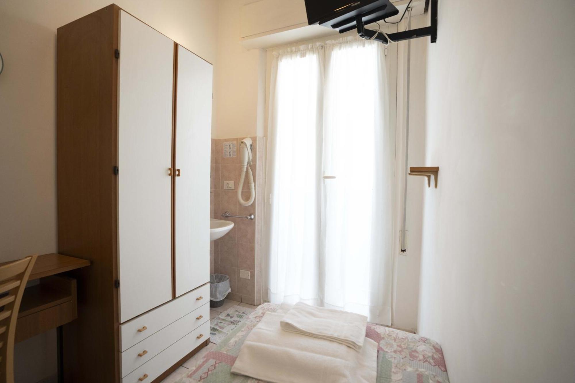 Camera Singola con Bagno Privato Esterno