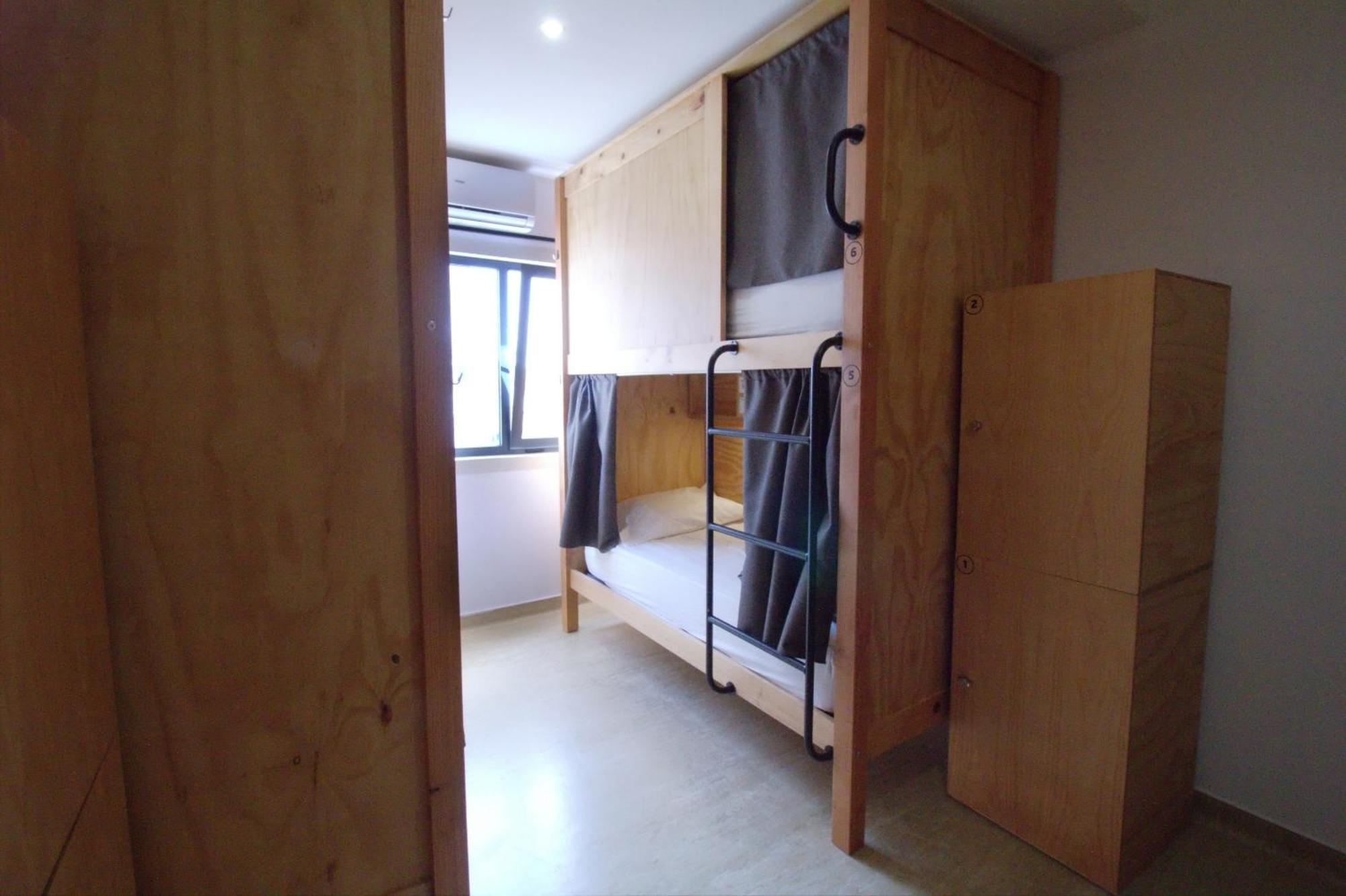 Cama em Dormitório Misto com 6 Camas