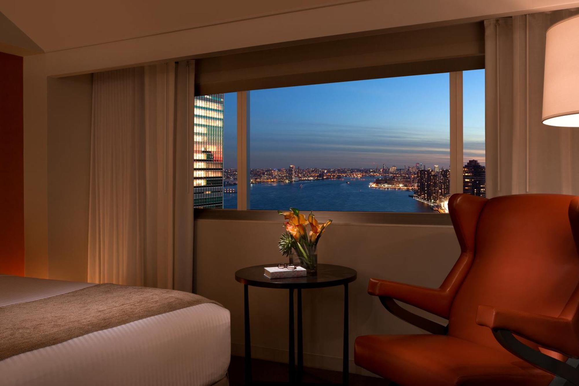 Quarto Deluxe com 2 Camas de Casal e Vista Cidade