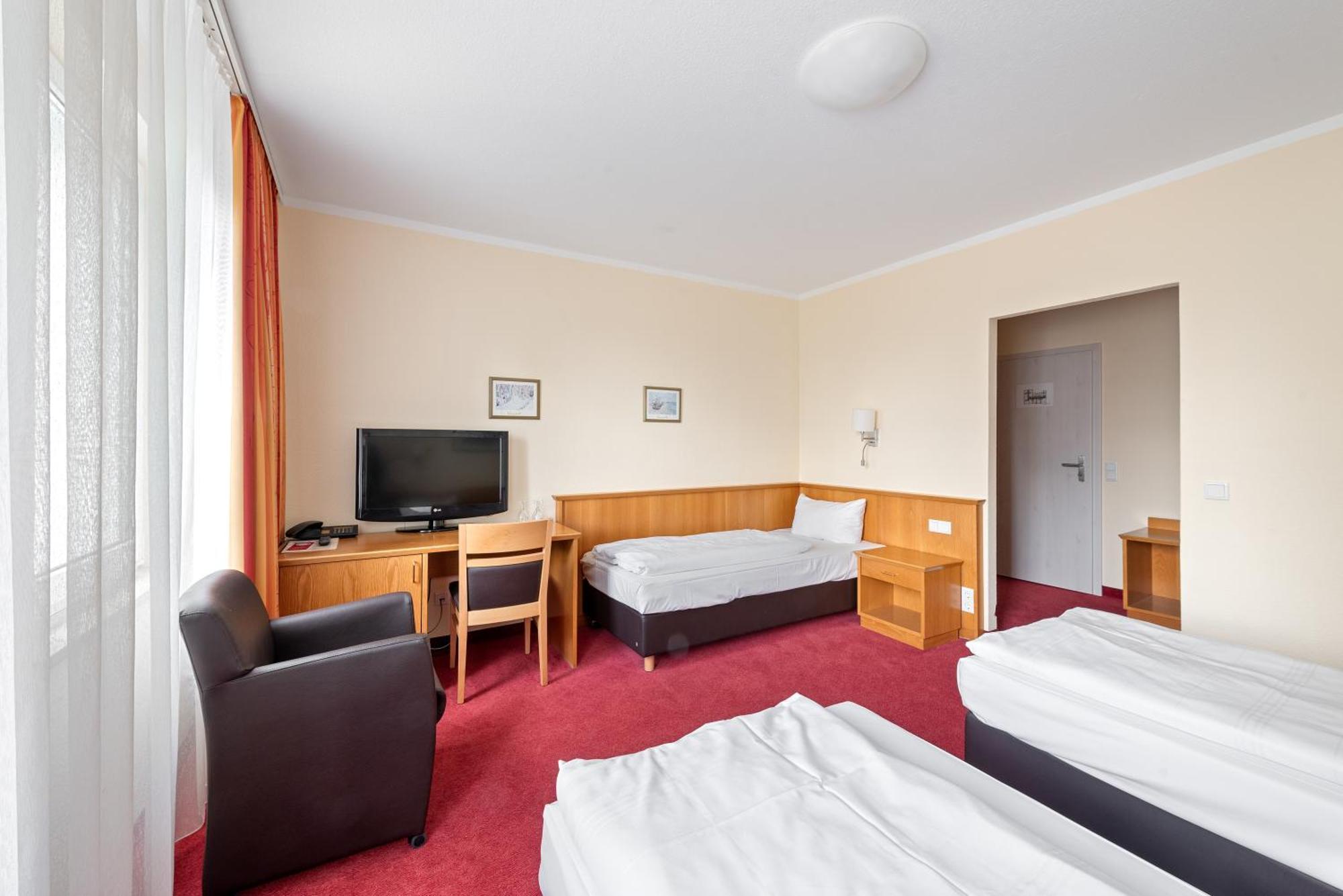 Dreibettzimmer