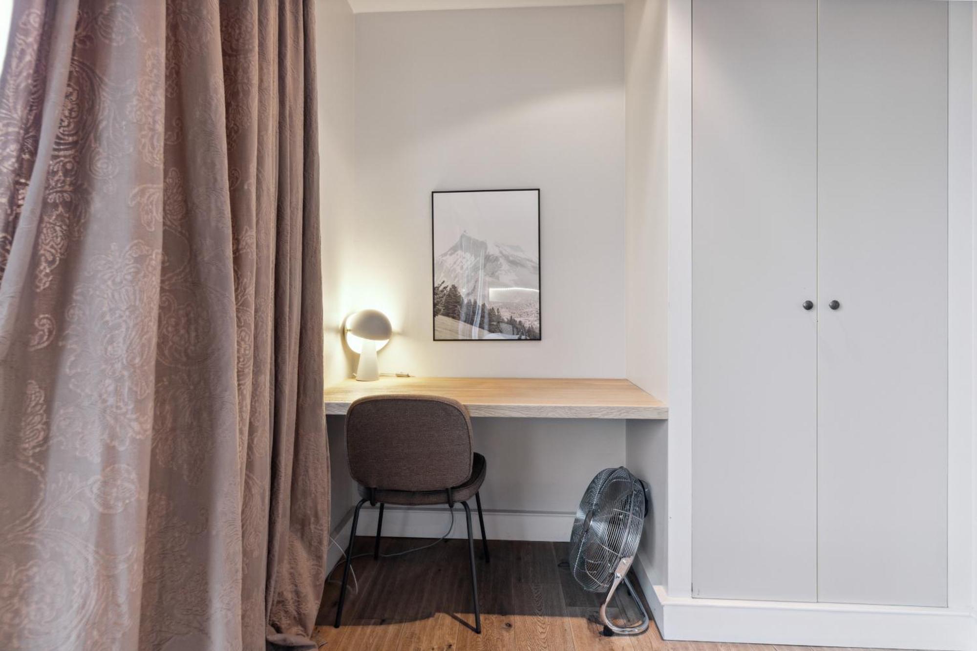 Suite M mit Dachterrasse und Blick auf die Stadt