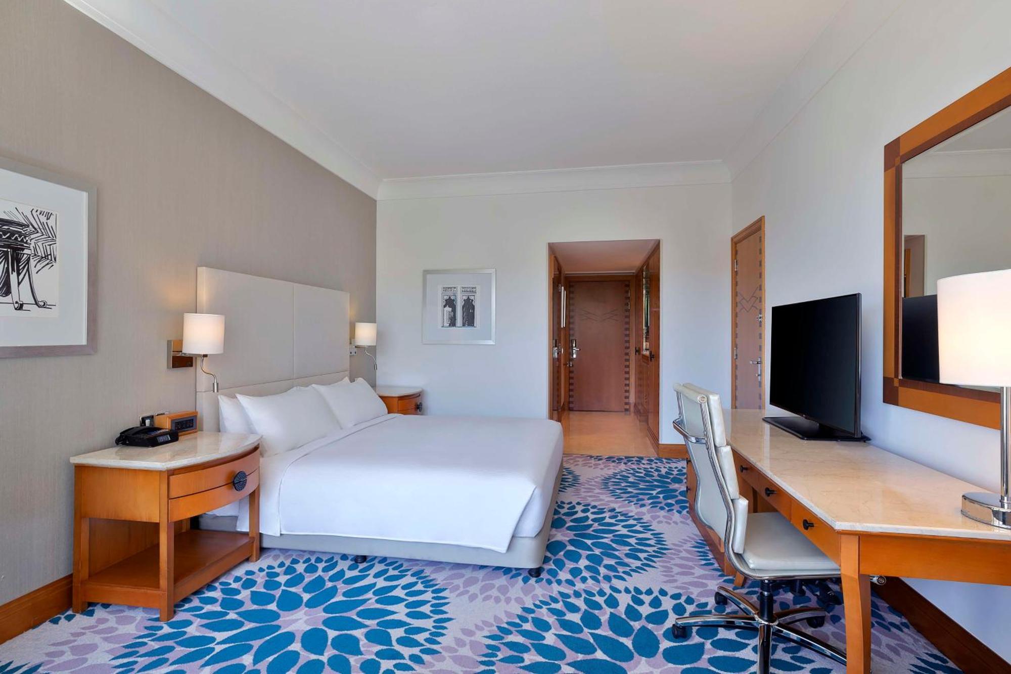 Deluxe Kamer met Kingsize Bed en Balkon - Uitzicht op Zee