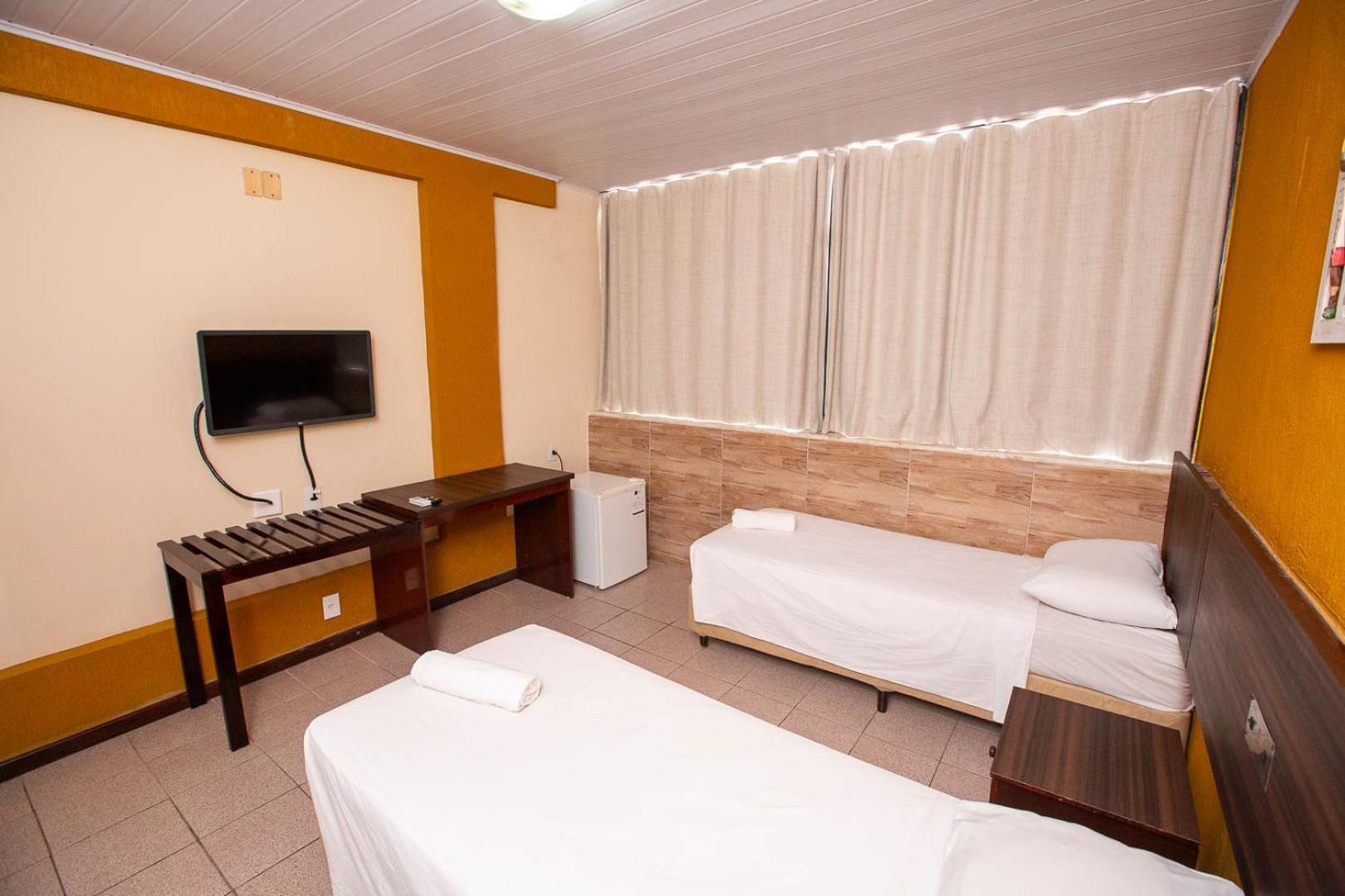 Quarto Triplo Standard com 3 Camas Individuais