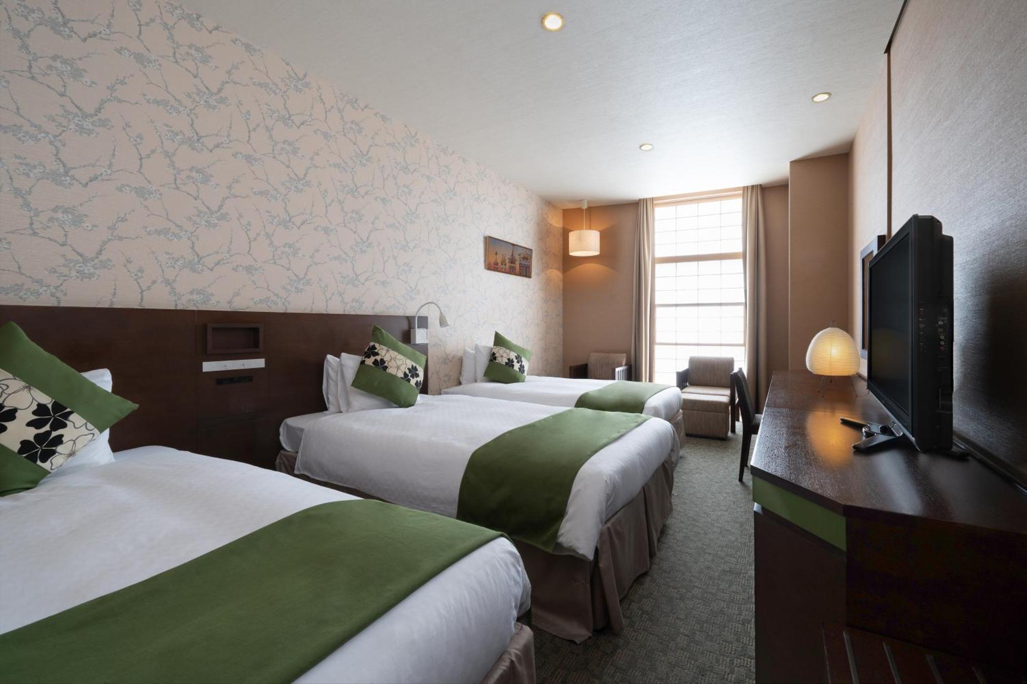 Chambre Triple Deluxe