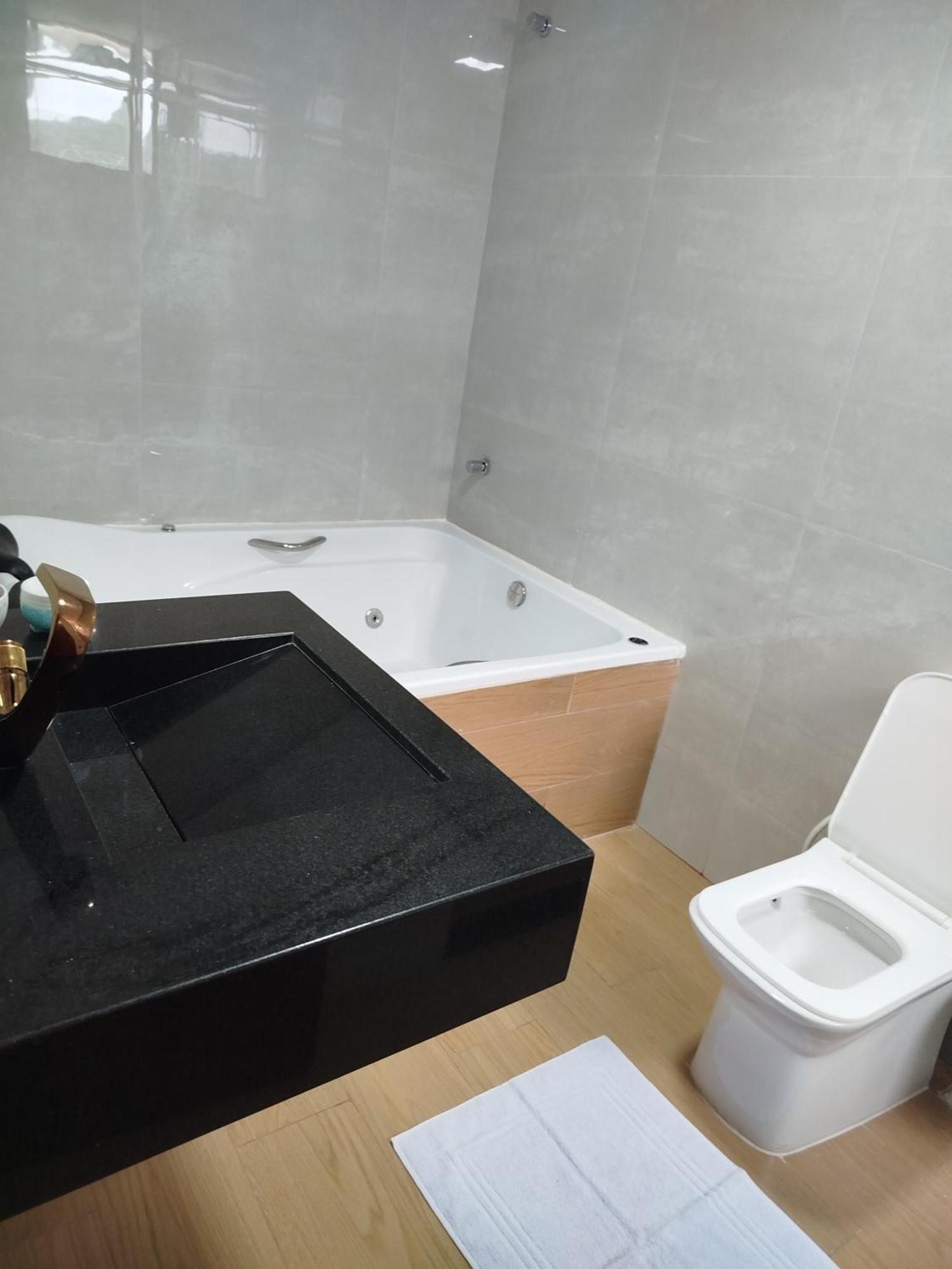 Quarto Duplo com Banheira de Hidromassagem