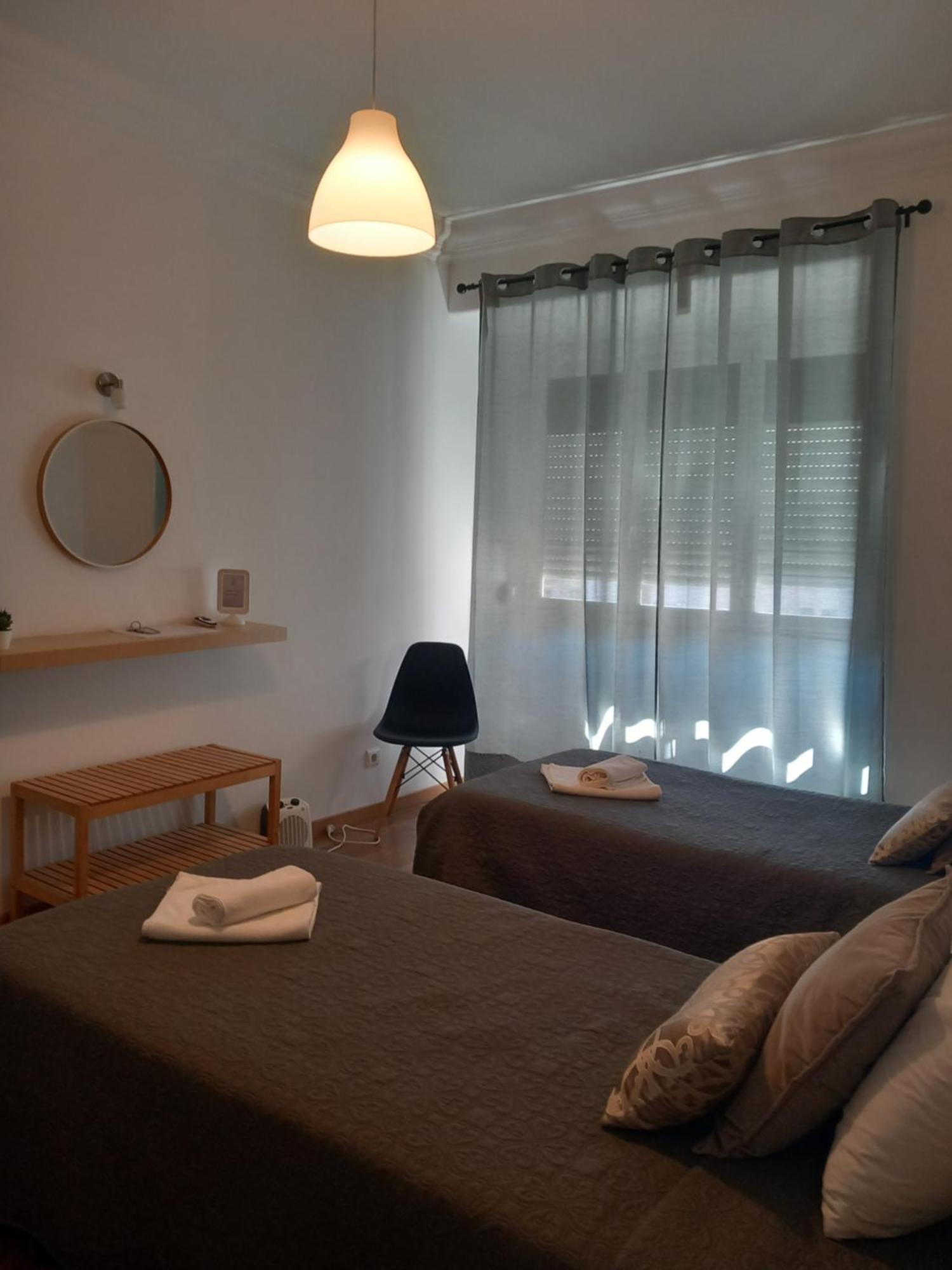 Quarto Twin com Casa de Banho Partilhada