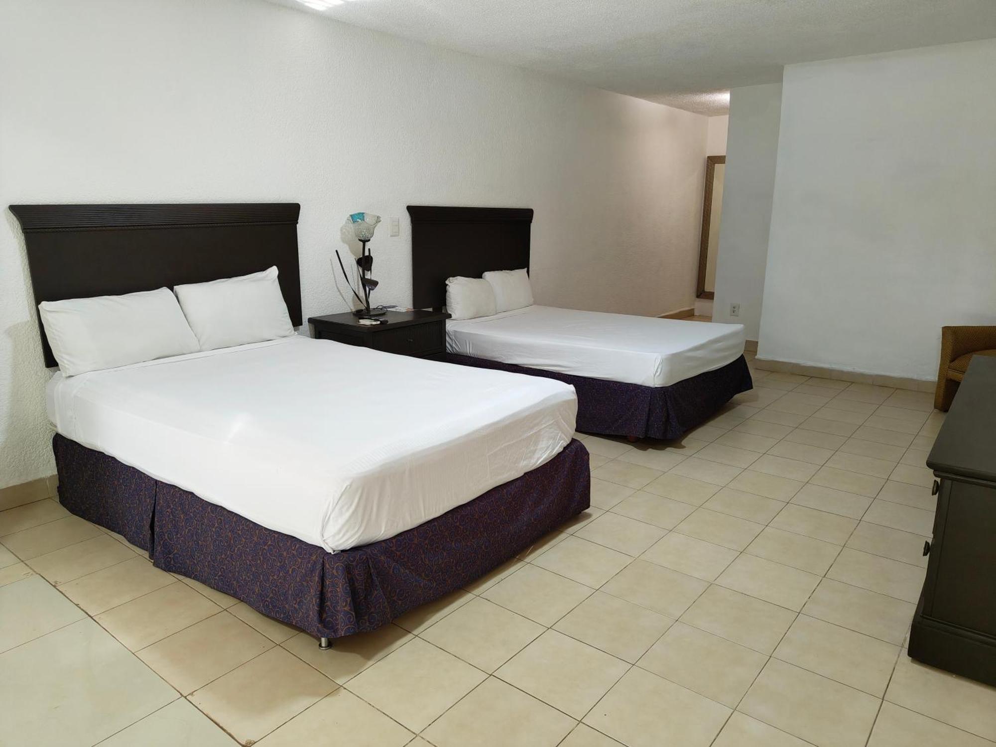 Tweepersoonskamer met 2 Aparte Bedden