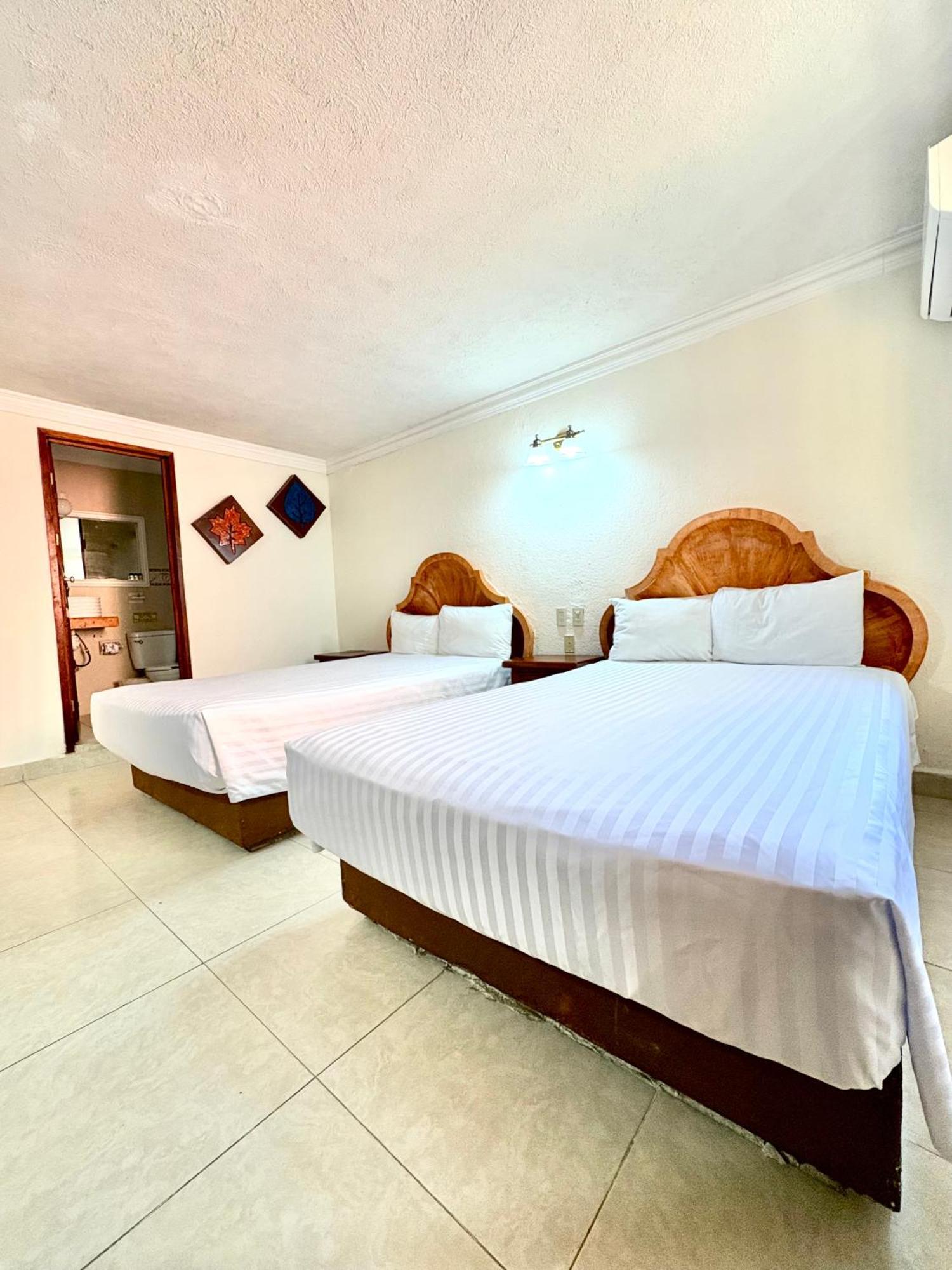 Quarto com 2 Camas de Solteiro