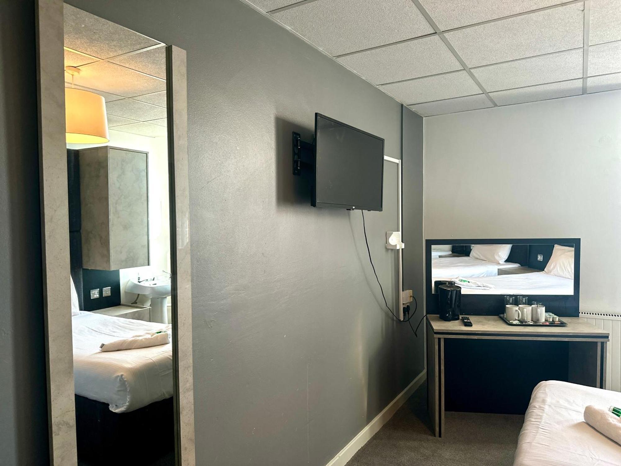 Chambre Triple avec Salle de Bains Commune