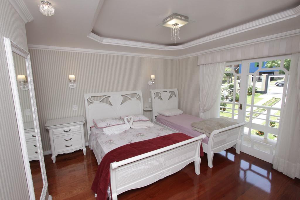Quarto Triplo com Varanda