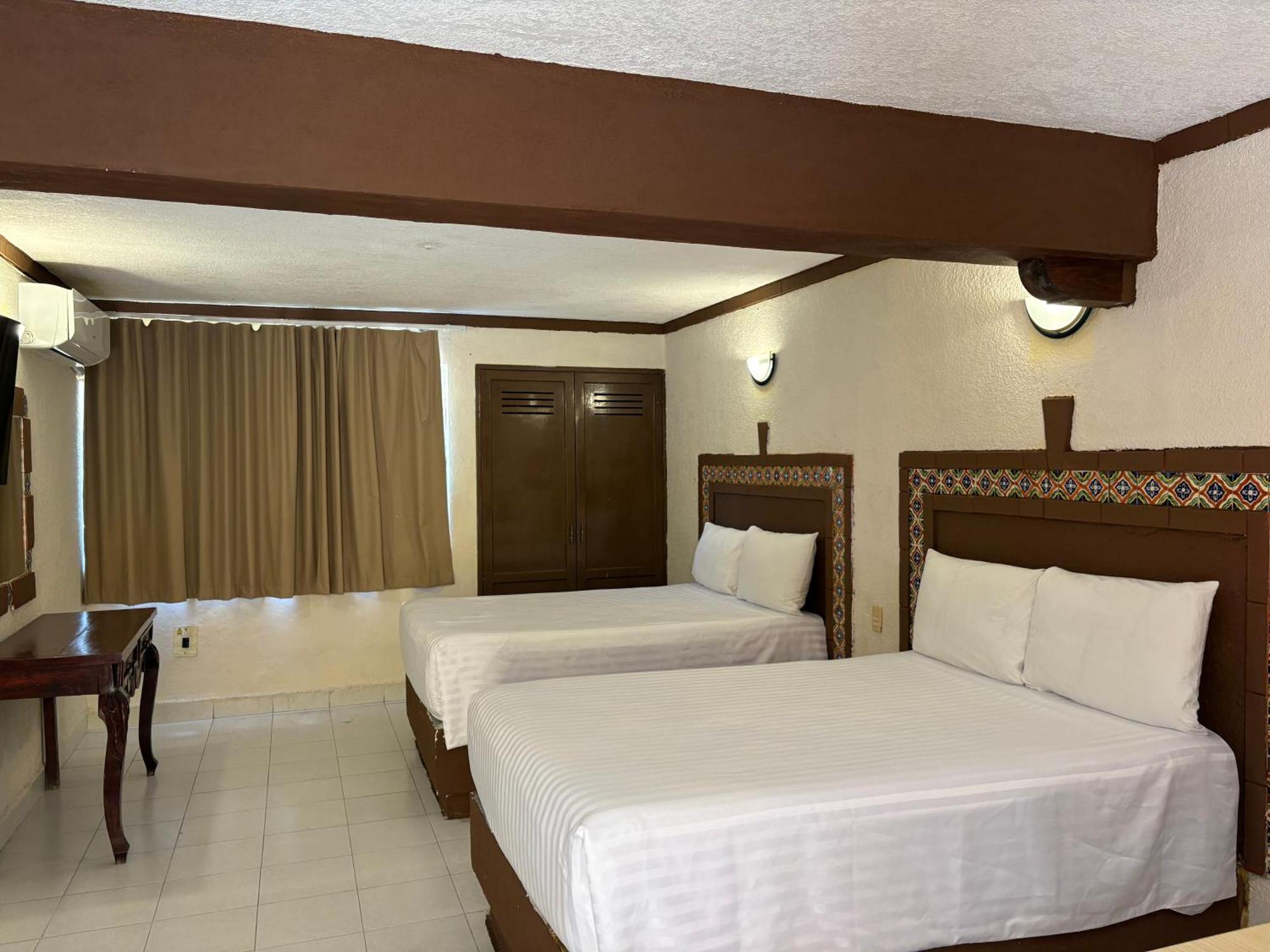 Quarto Superior com 2 Camas de Solteiro