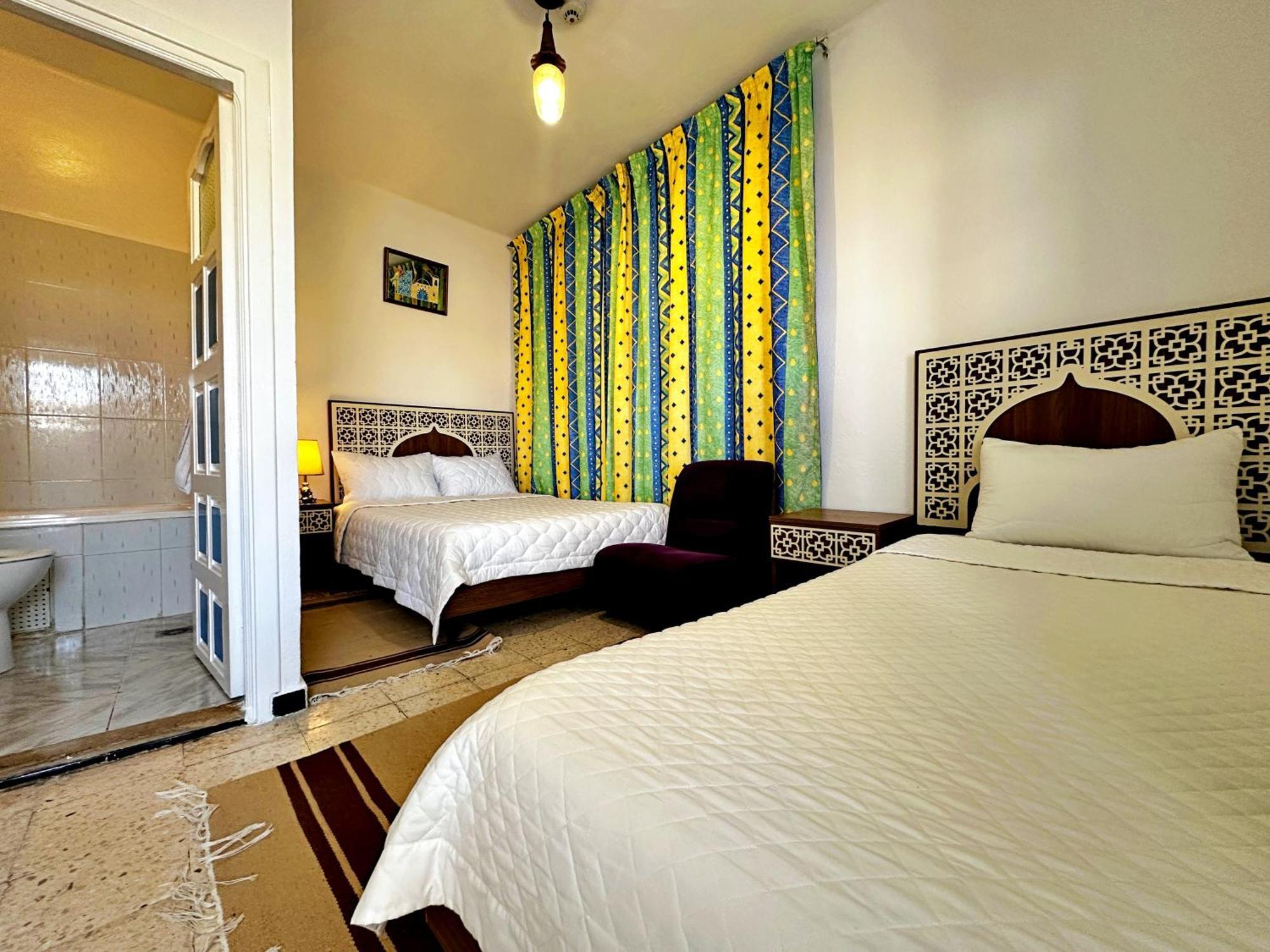 Chambre Triple avec Salle de Bains Privative