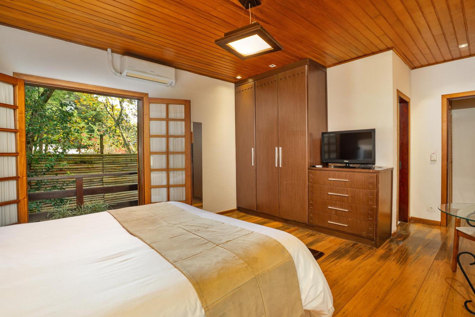 Suíte com Cama King-size e Varanda