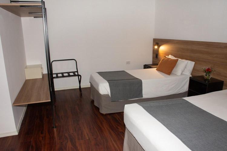Quarto Triplo Executivo