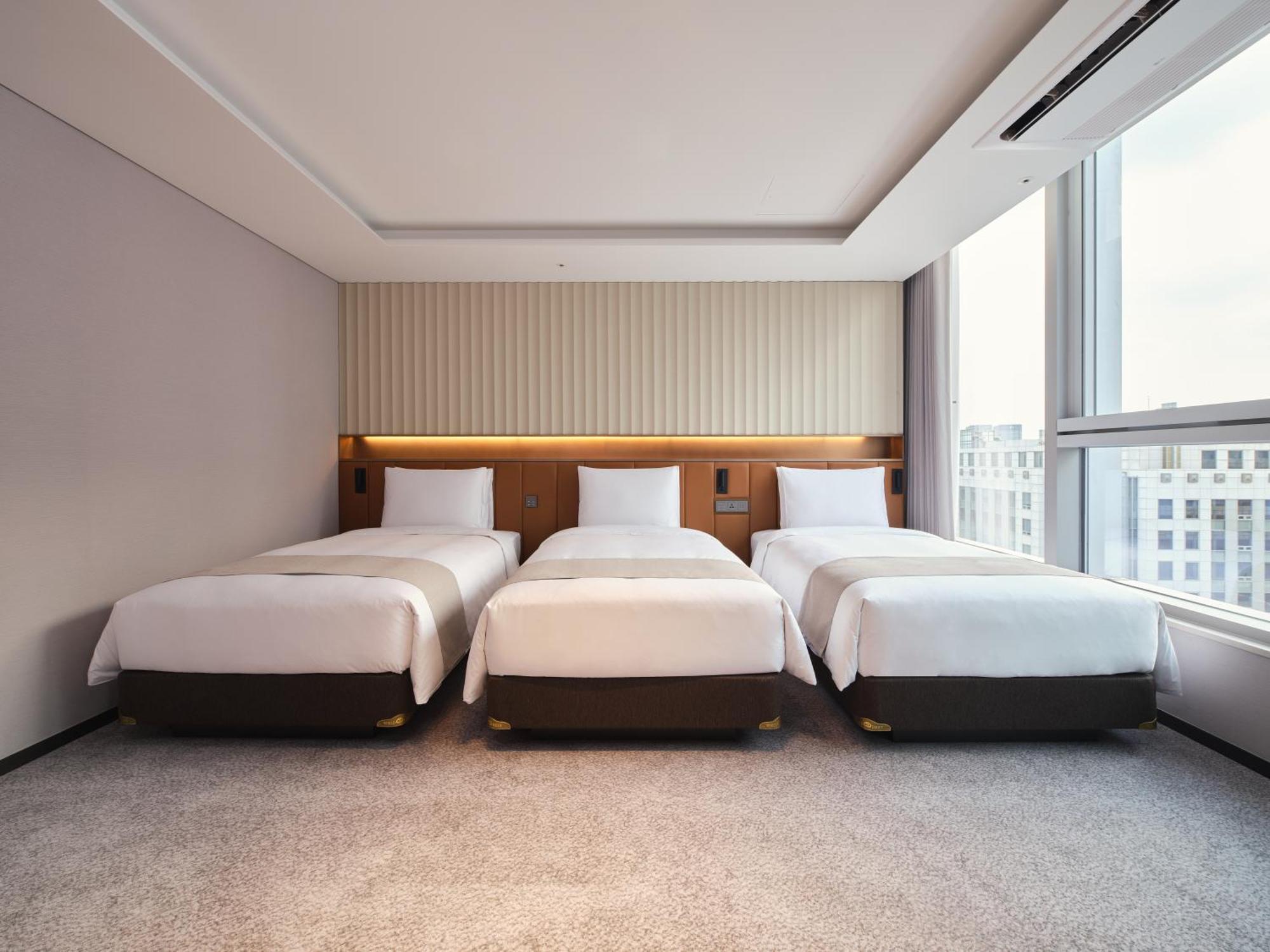 Premier Dreibettzimmer