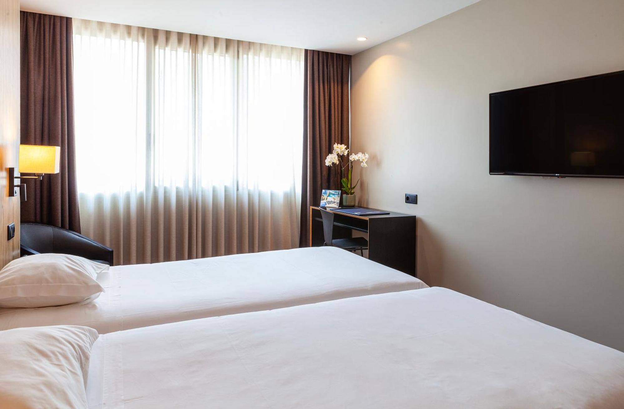 Quarto com 2 Camas de Solteiro