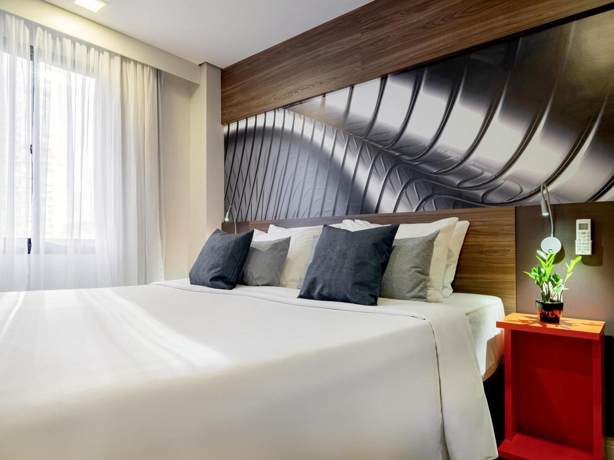 Suíte Júnior com Cama King-size e 2 de Solteiro