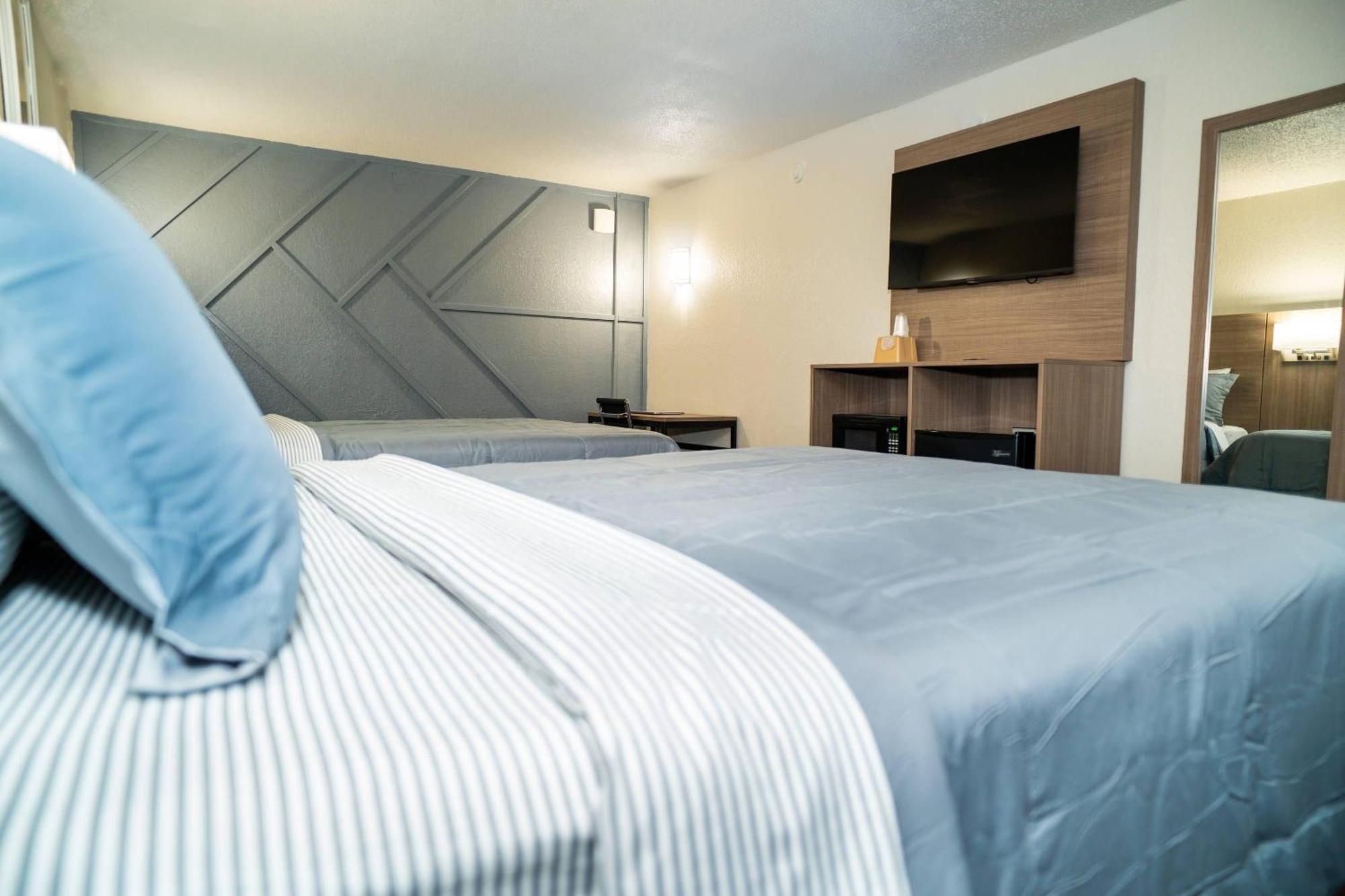 Chambre Double avec 2 Lits Doubles - Fumeurs