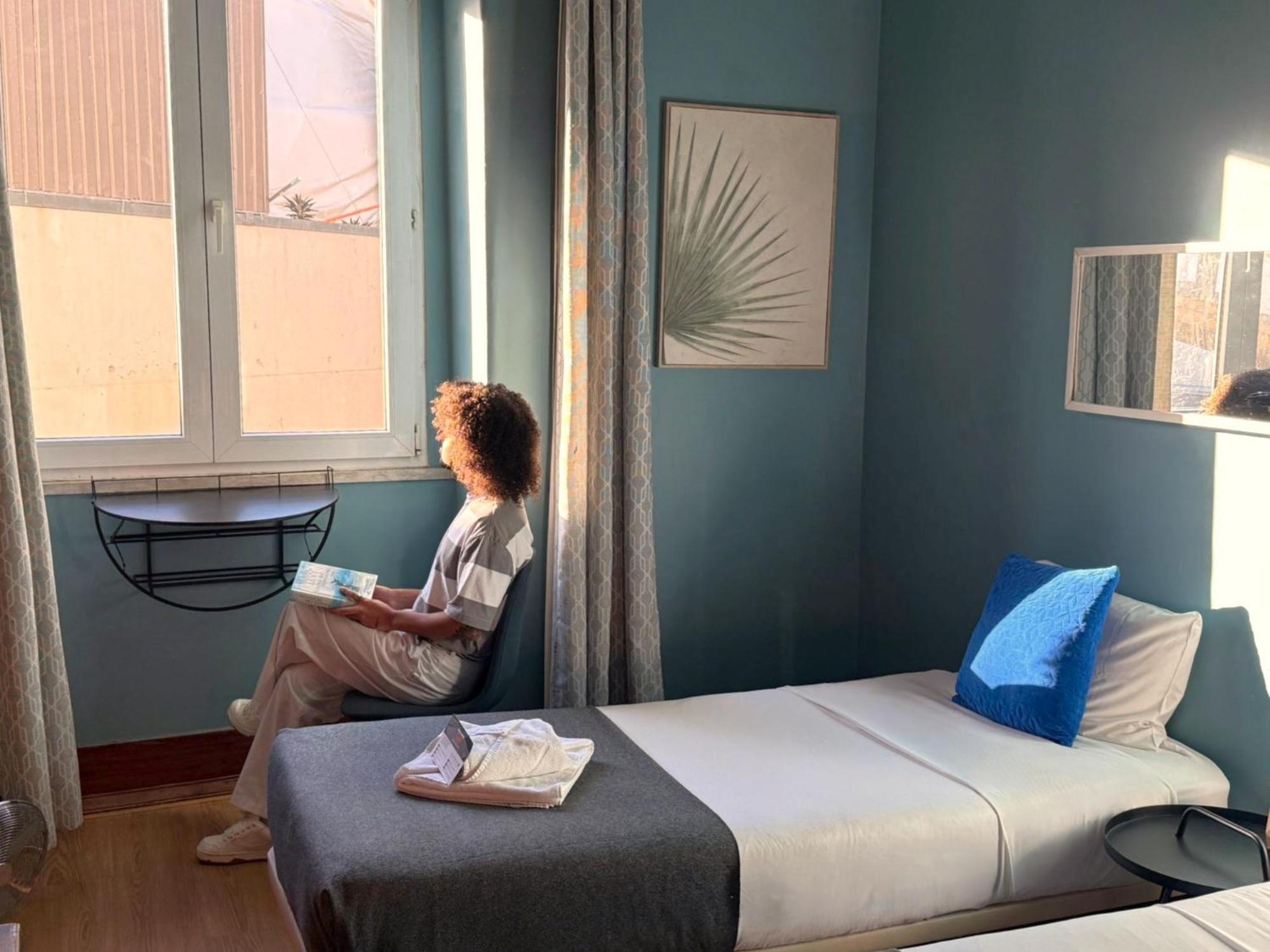 Quarto Twin com Casa de Banho Partilhada