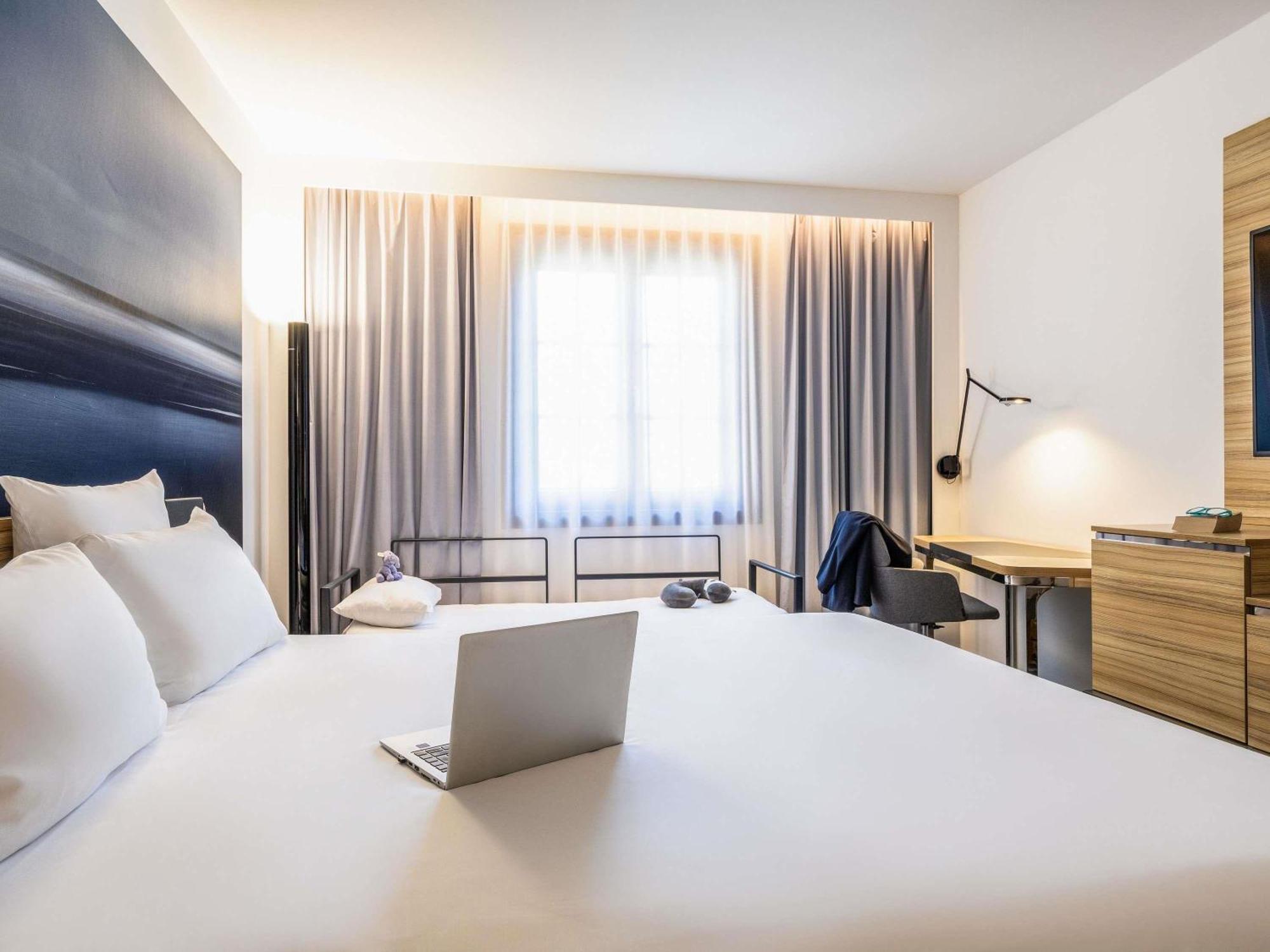 Superior Kamer met 1 Tweepersoonsbed en een Bank.