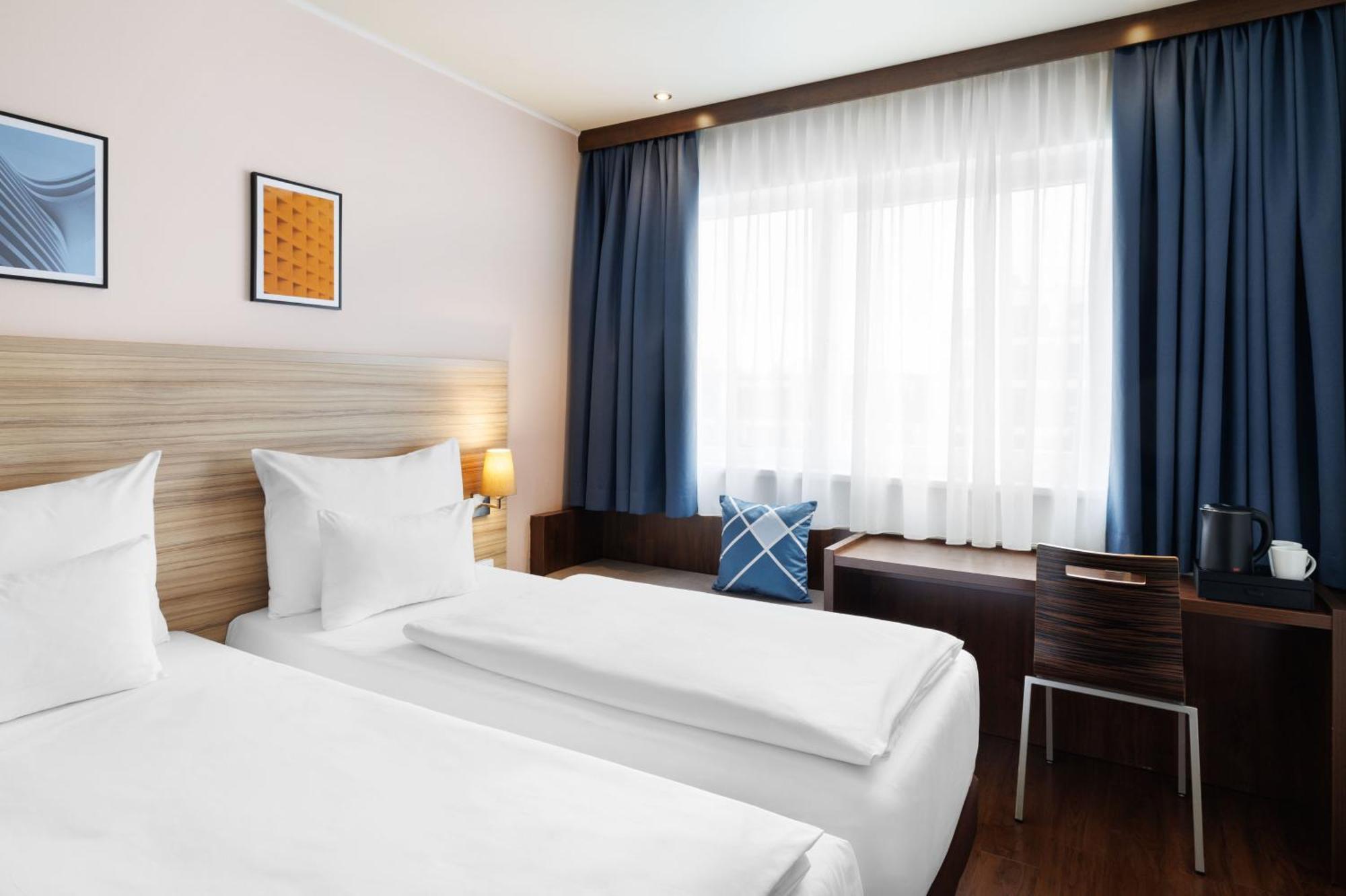 Standard Zweibettzimmer mit 2 Einzelbetten