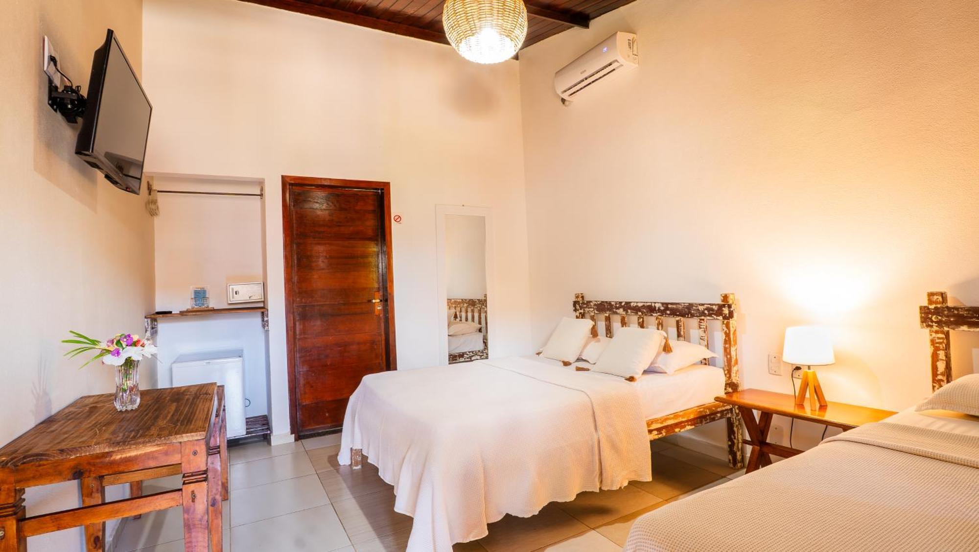 Quarto Triplo Executivo