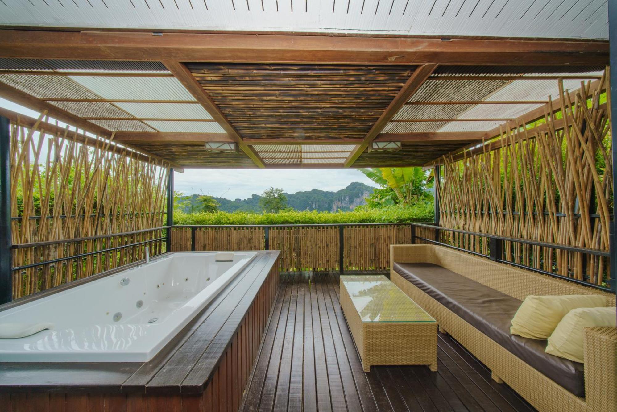 Suite mit Kingsize-Bett mit Whirlpool