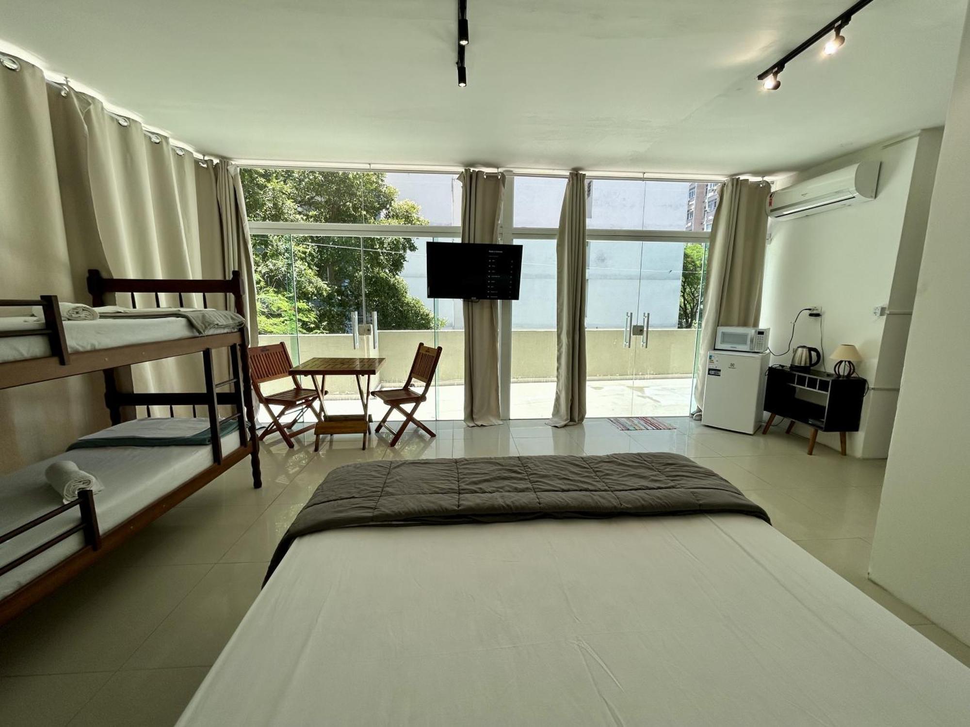 Quarto Quádruplo com Varanda