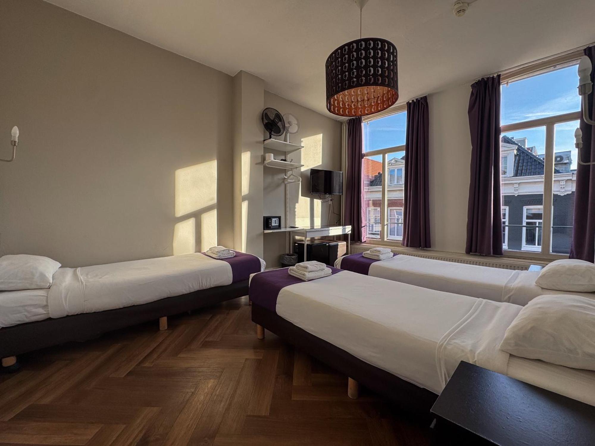 Economy Dreibettzimmer mit Gemeinschaftsbad