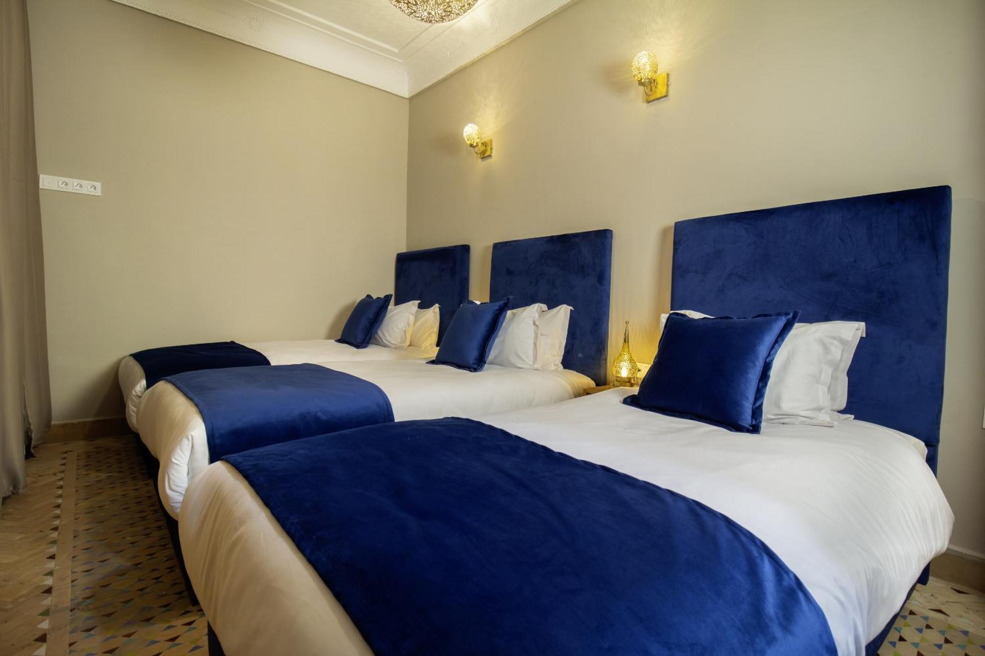 Chambre Triple avec Douche