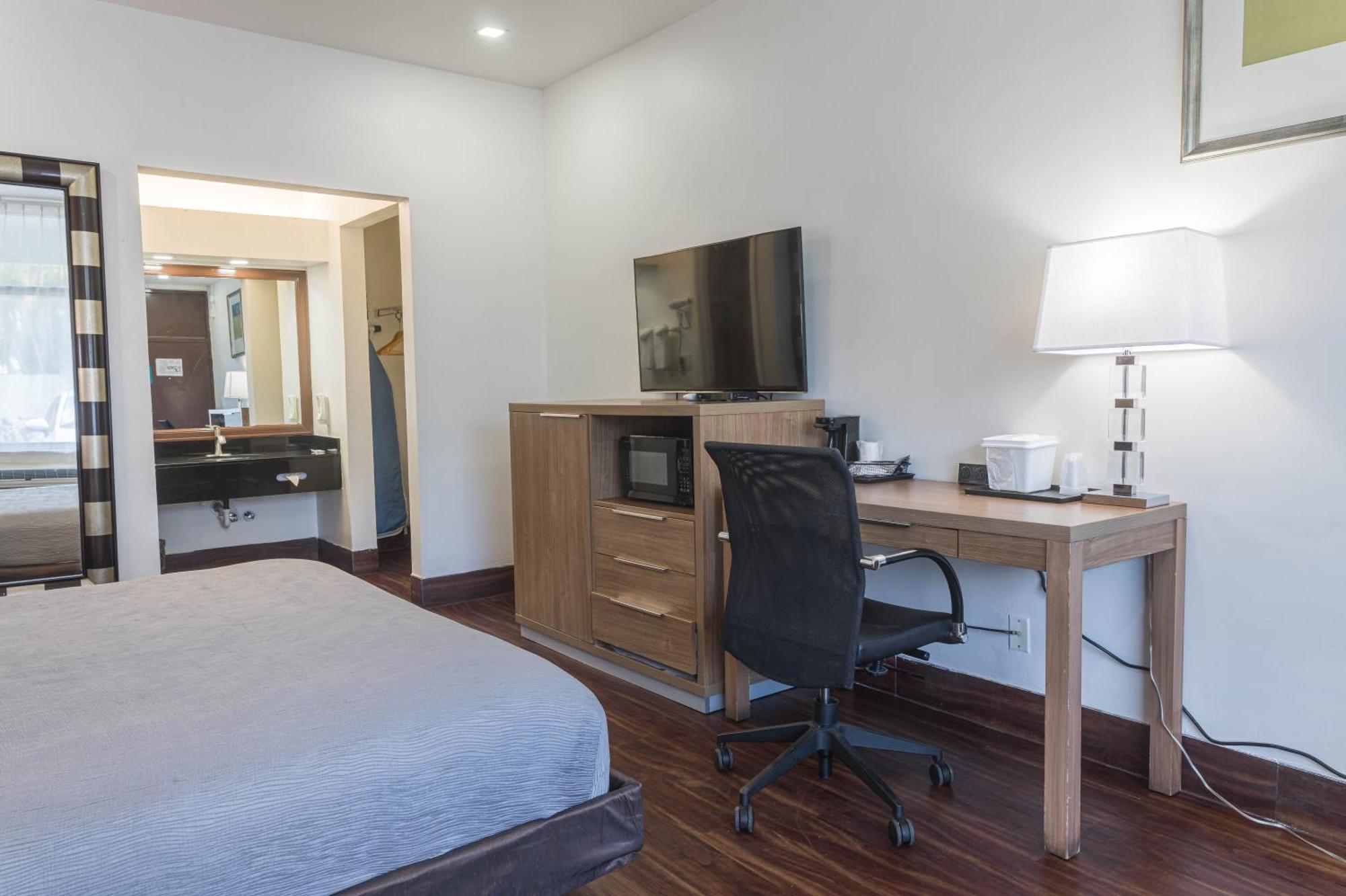 Chambre Lit Queen-Size Deluxe