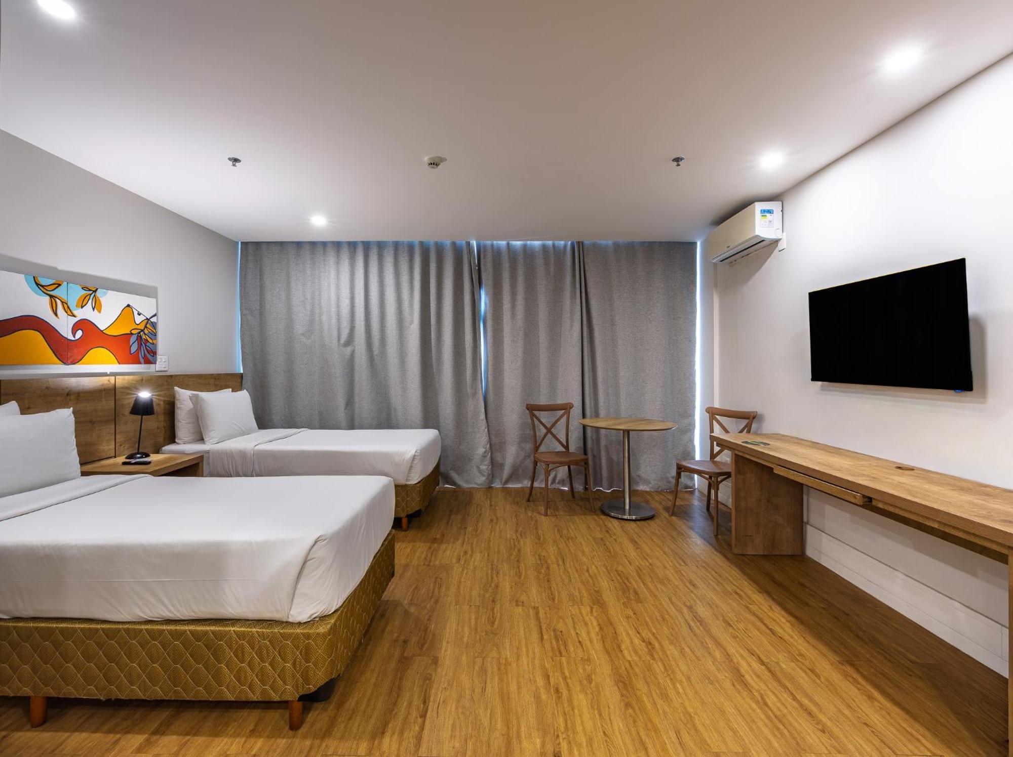 Quarto Twin Deluxe com Varanda