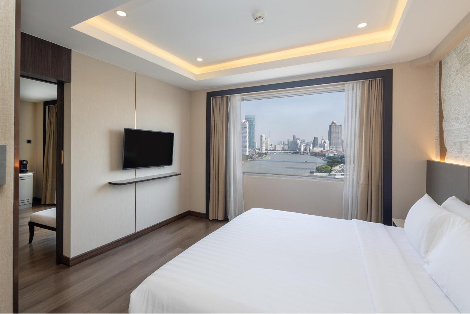 Suite met Kingsize Bed en Balkon - Uitzicht op de Rivier