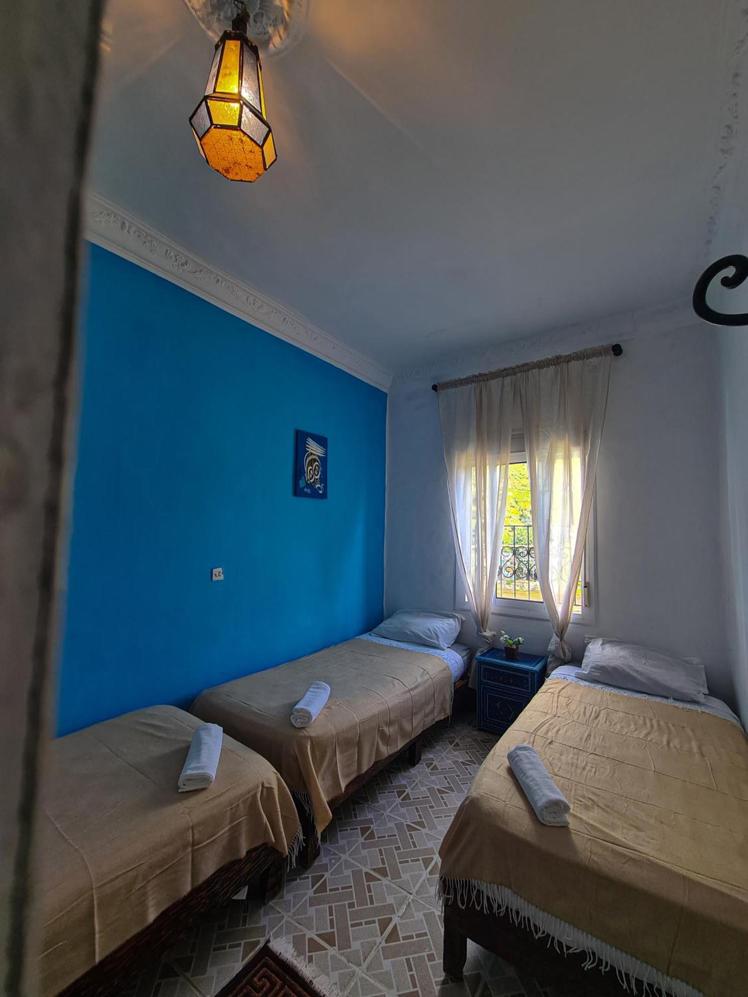 Chambre Triple avec Salle de Bains Commune