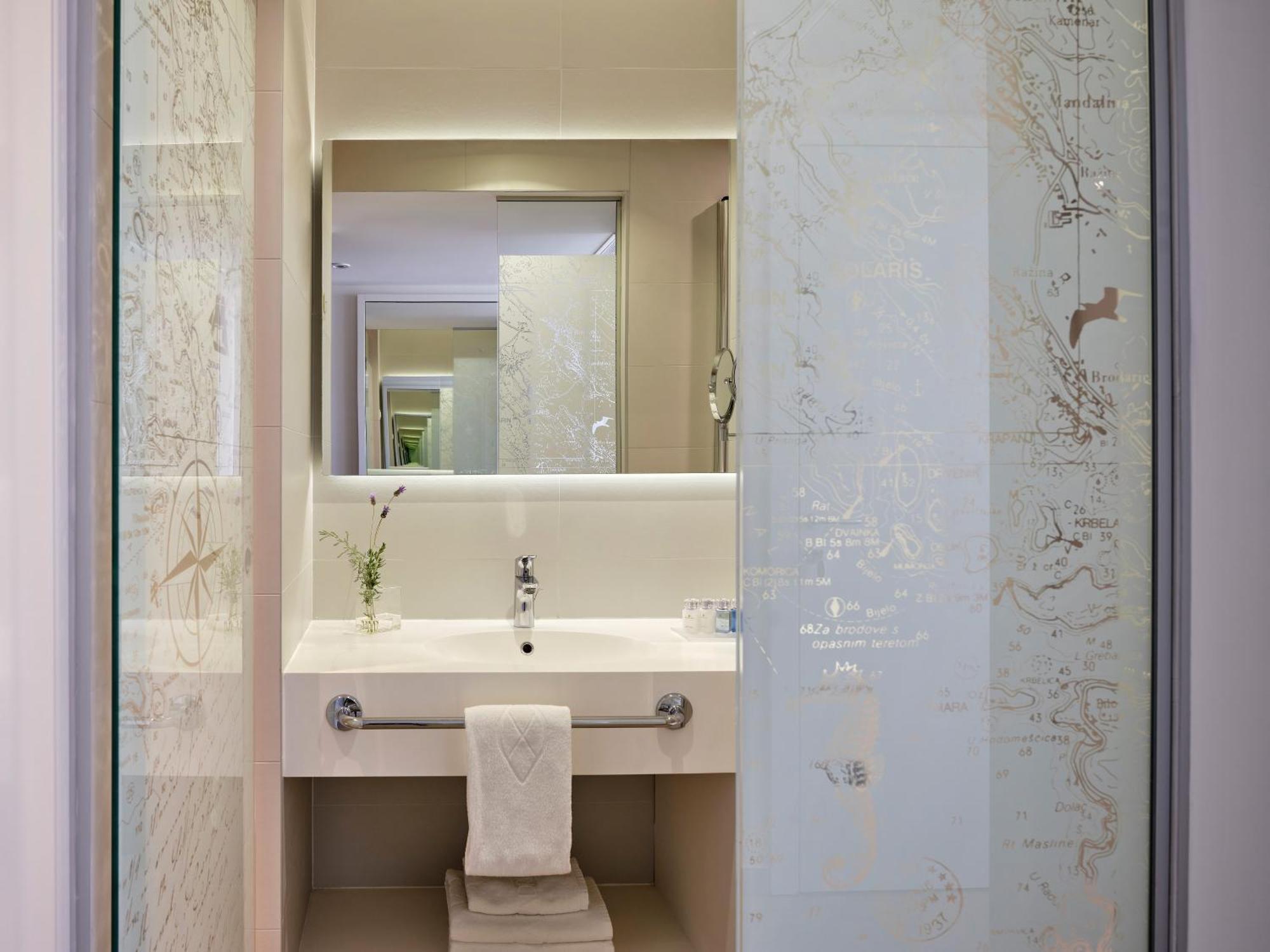 Double or Twin Room with Extra Bed - Courtyard View