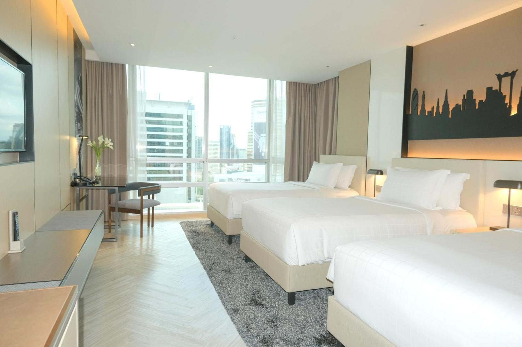 Grand Deluxe Dreibettzimmer