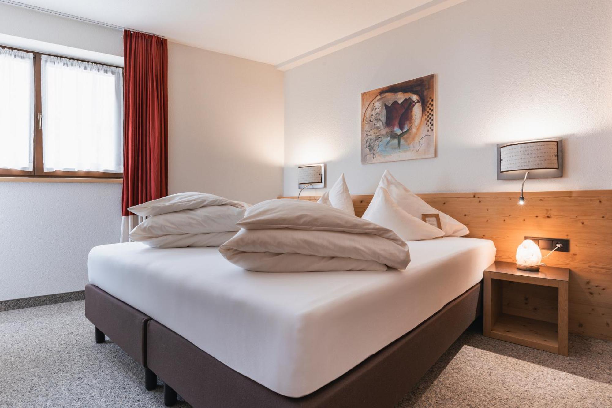 Dreibettzimmer mit Balkon