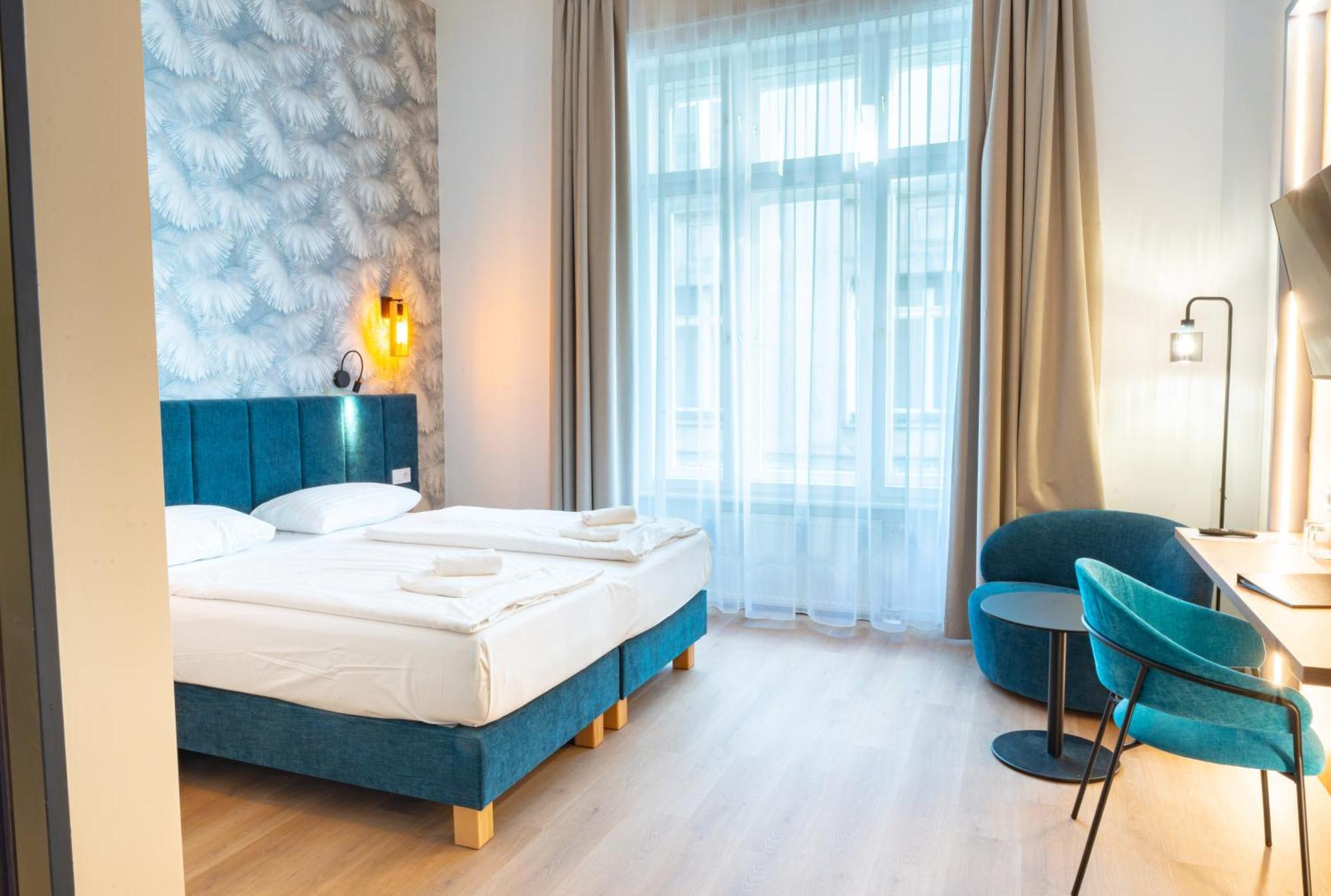 Chambre Double ou Lits Jumeaux de Luxe - Vue sur Rue