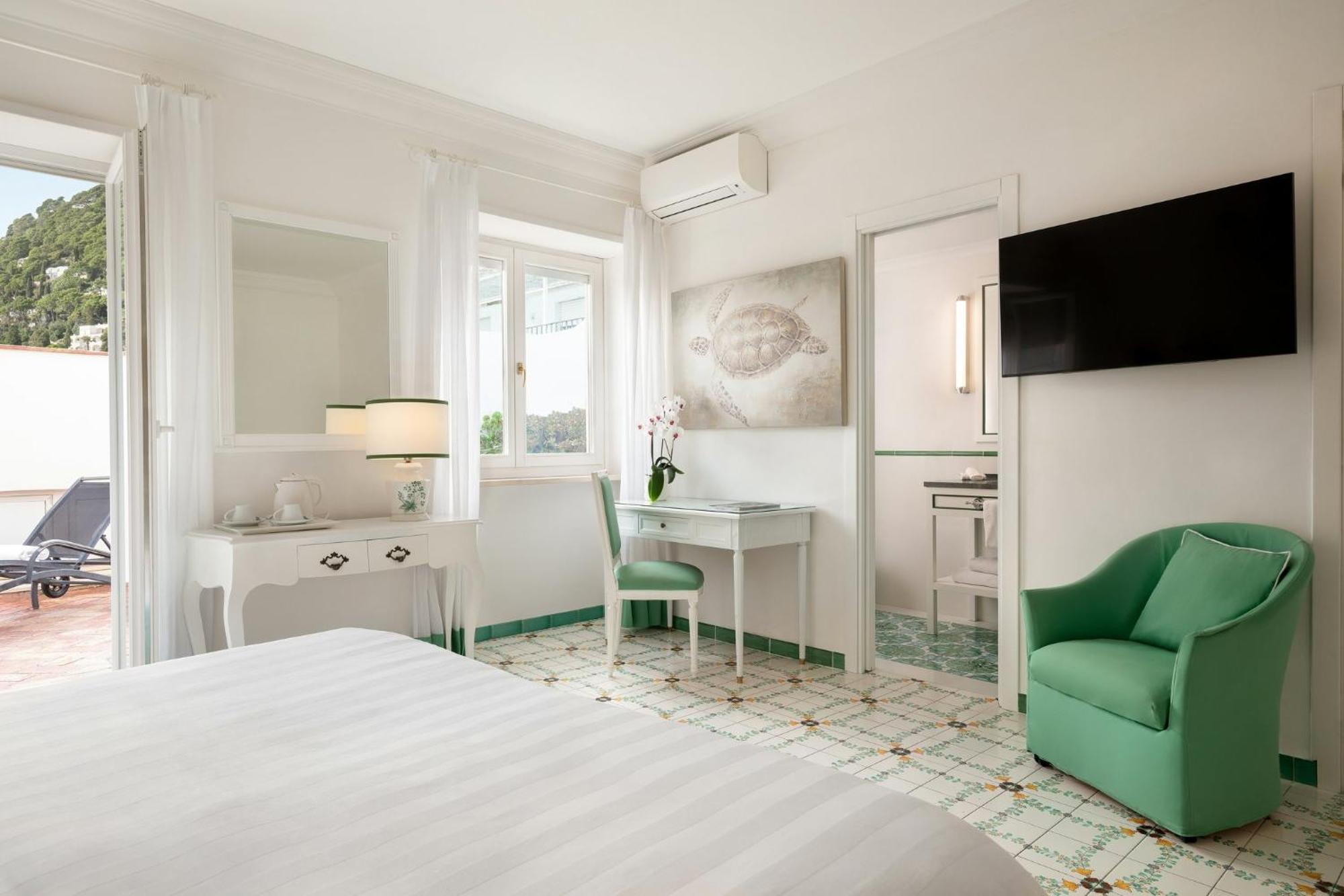 Habitación Doble Deluxe con vistas laterales al mar