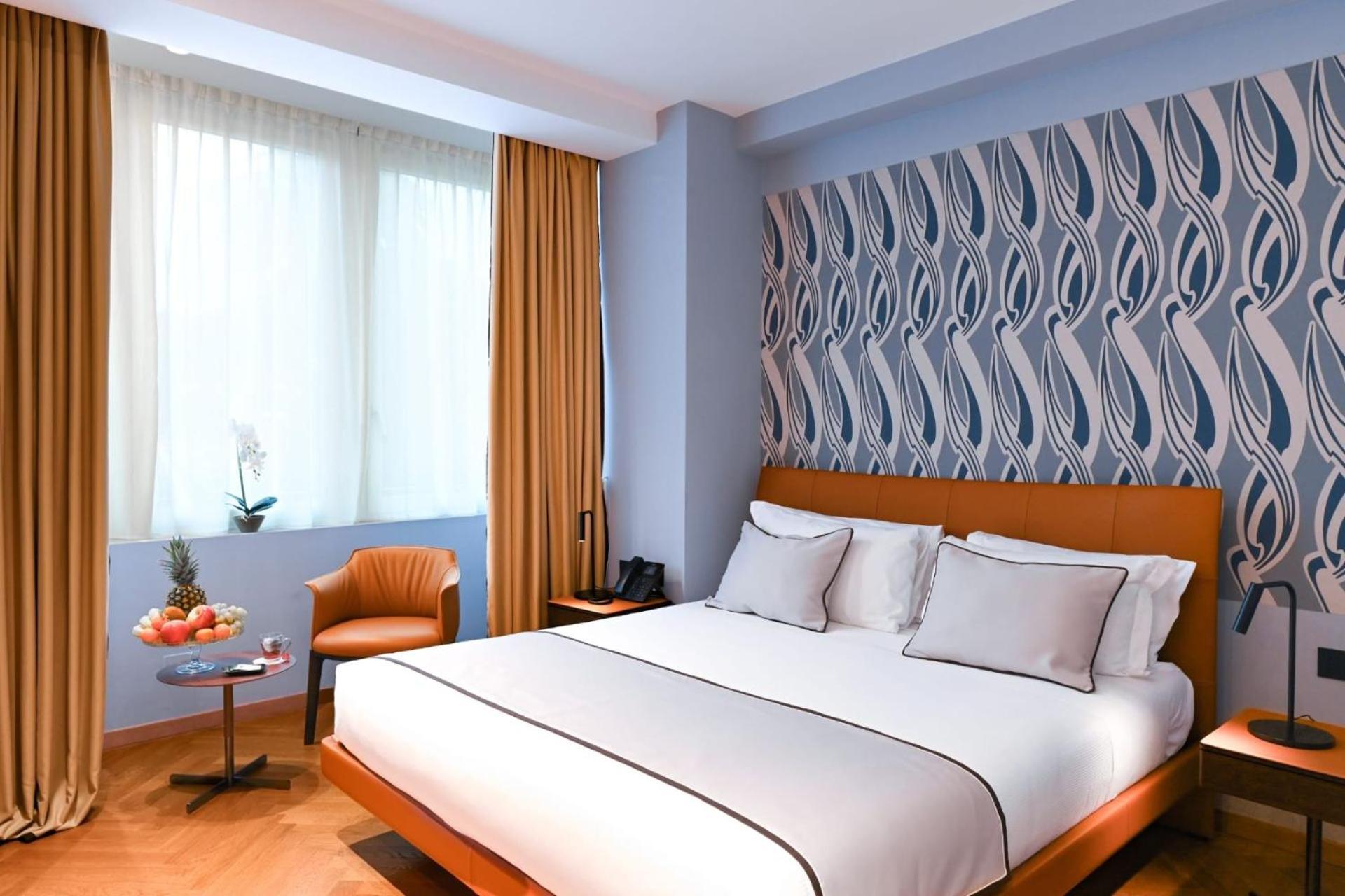Deluxe Tweepersoonskamer met 1 of 2 Bedden en Gedeeltelijk Uitzicht op Zee