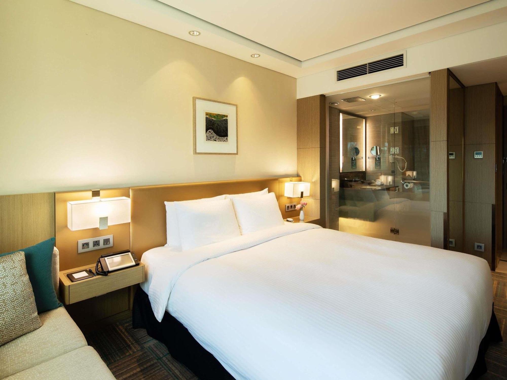 Chambre Exécutive Lit Queen-Size