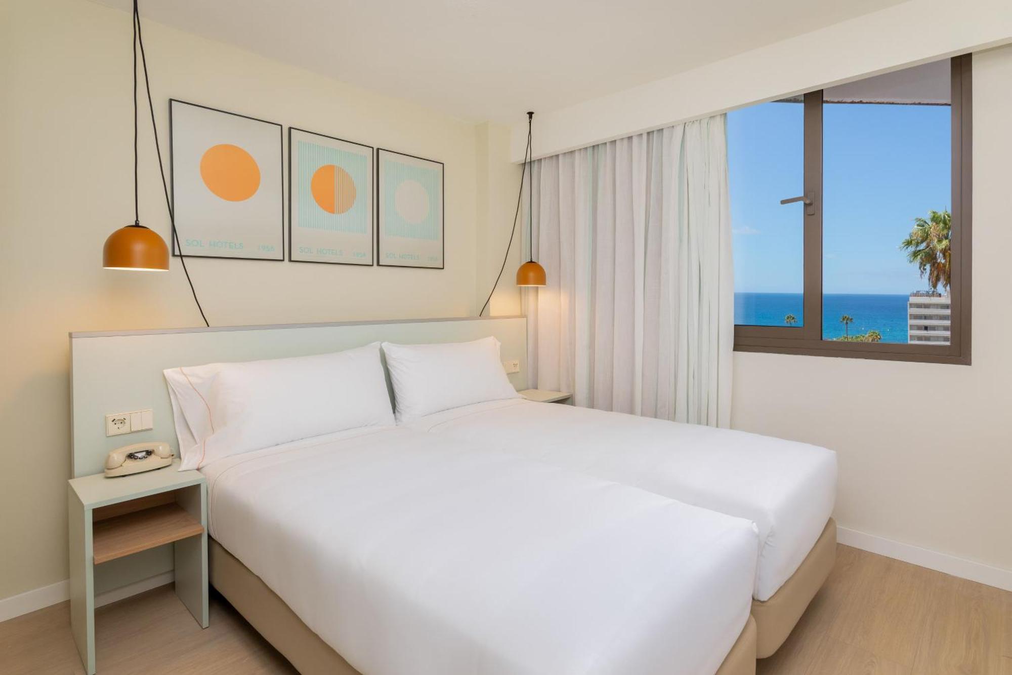 Sol-Zimmer mit Lounge und Meerblick