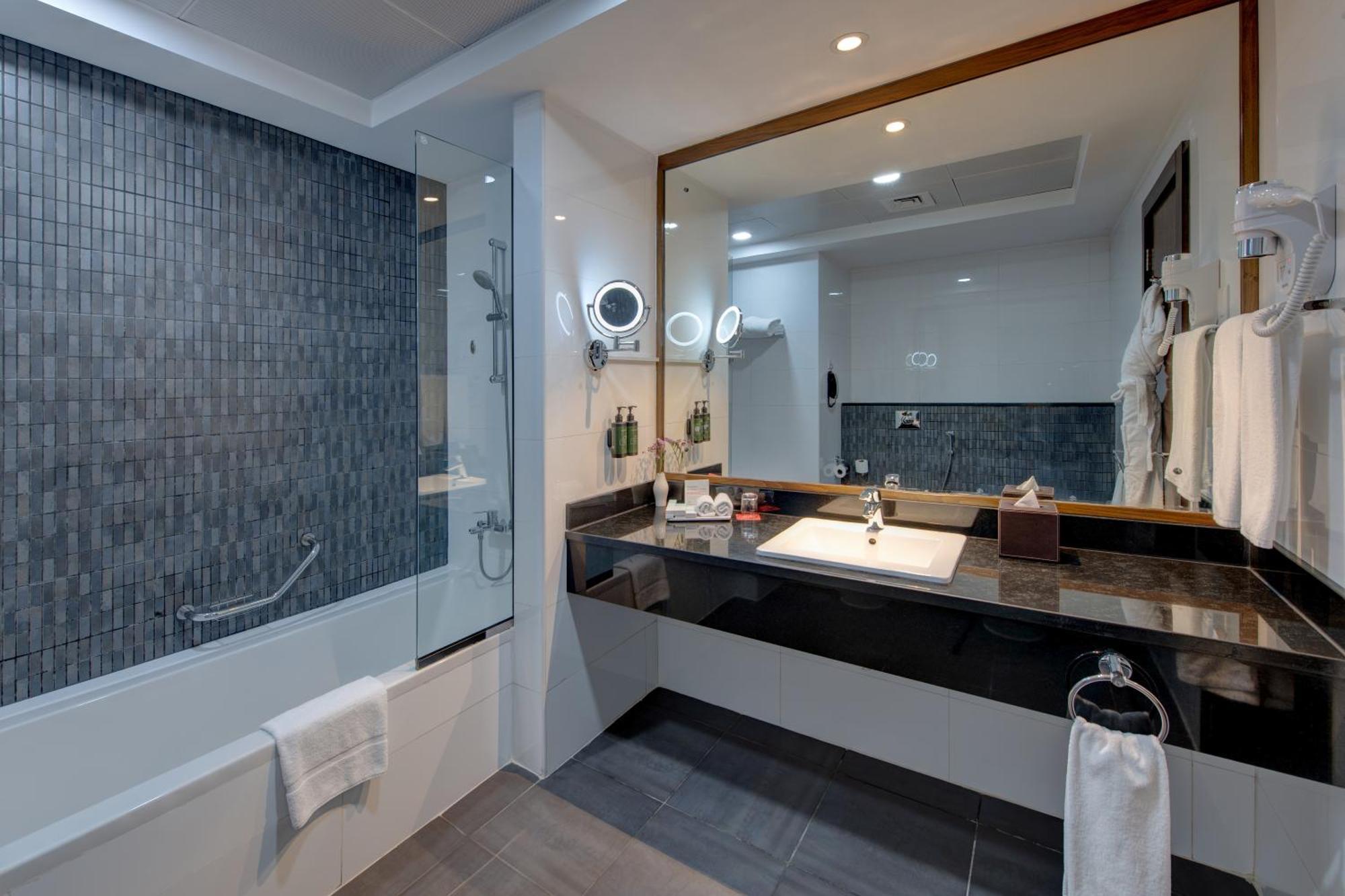 Chambre Lit King-Size Deluxe - Vue sur Ville