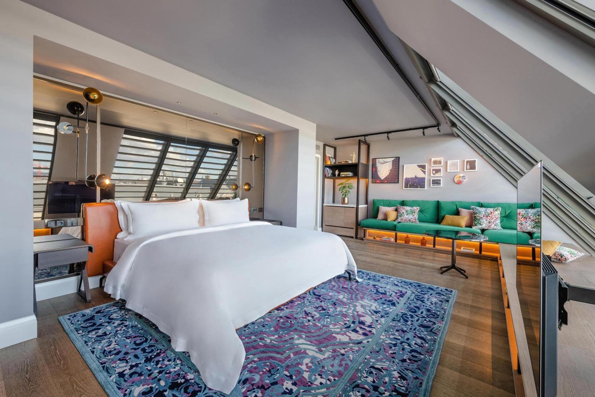 Loft-Zimmer mit 1 Kingsize-Bett und Donaublick