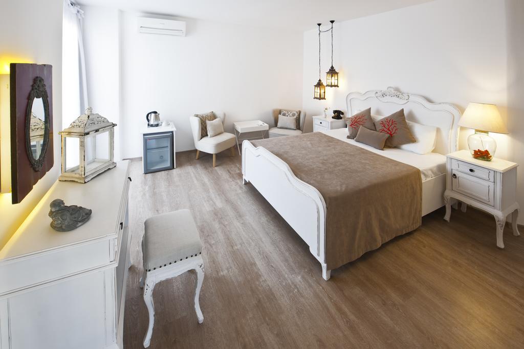 Suite con cama extragrande, terraza y bañera de hidromasaje