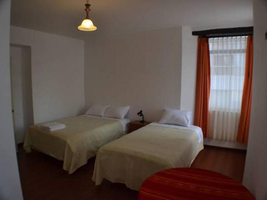 Habitación Triple con baño privado